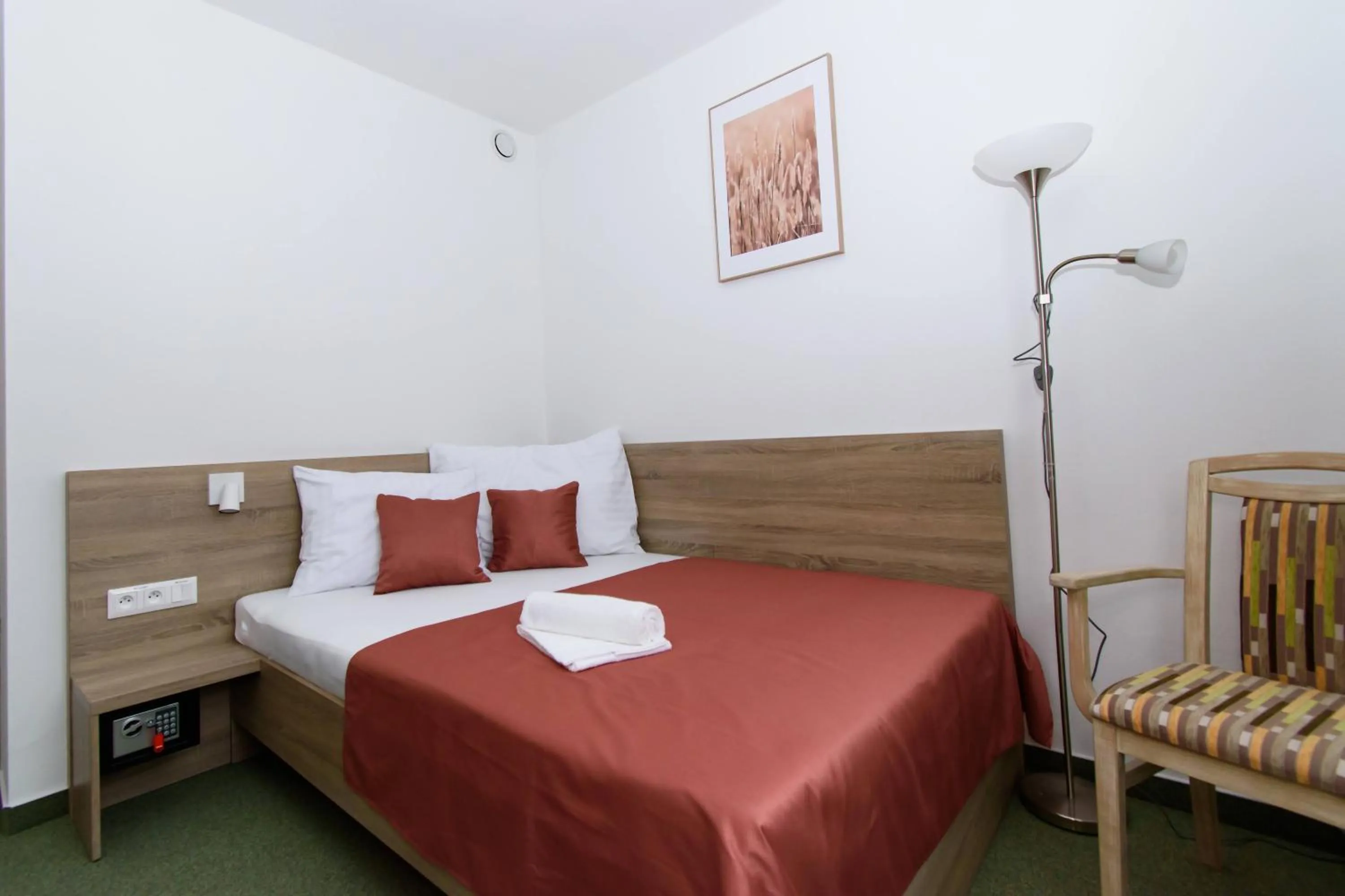 Bed in Solid Gold Garni Hotel