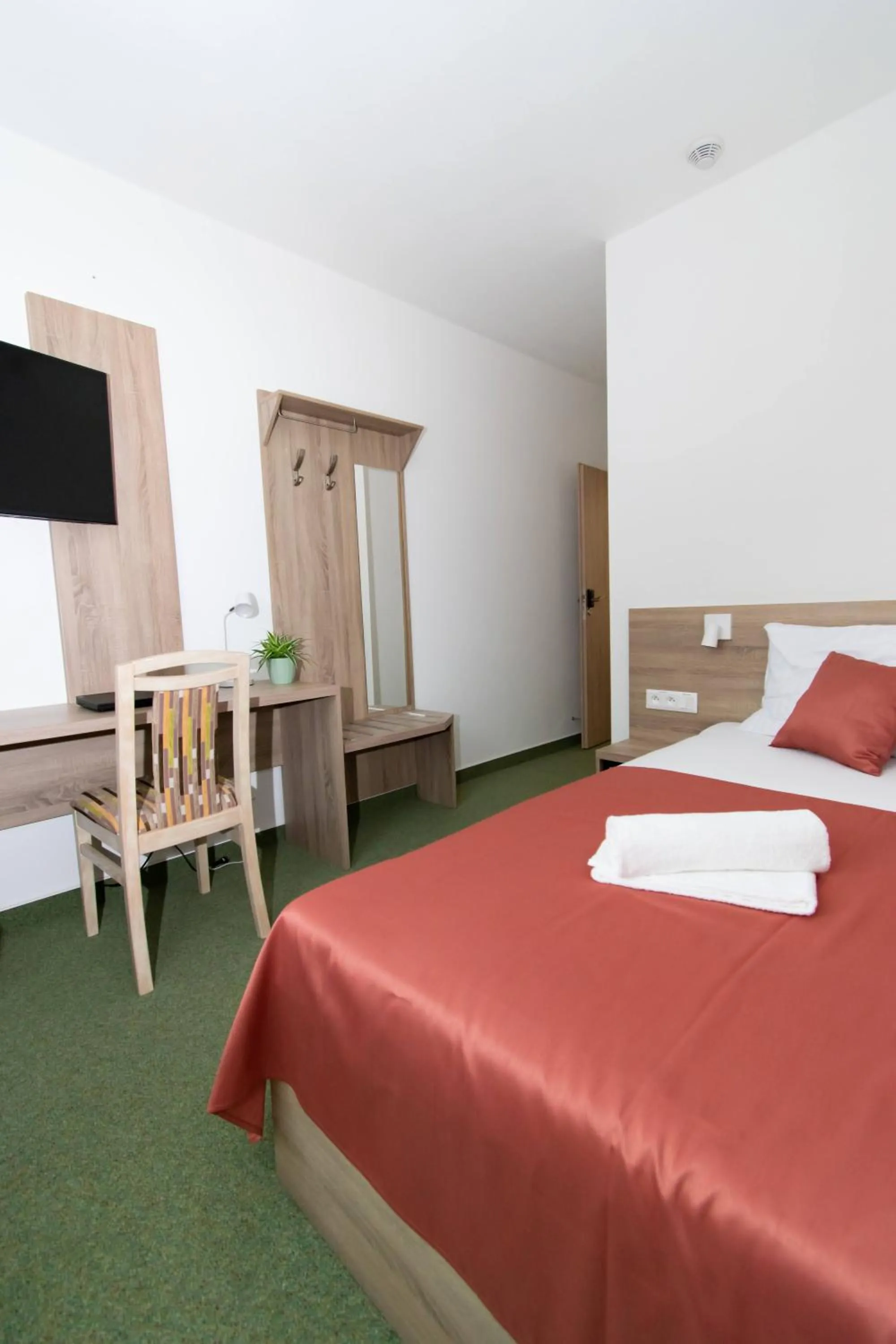 Bed in Solid Gold Garni Hotel