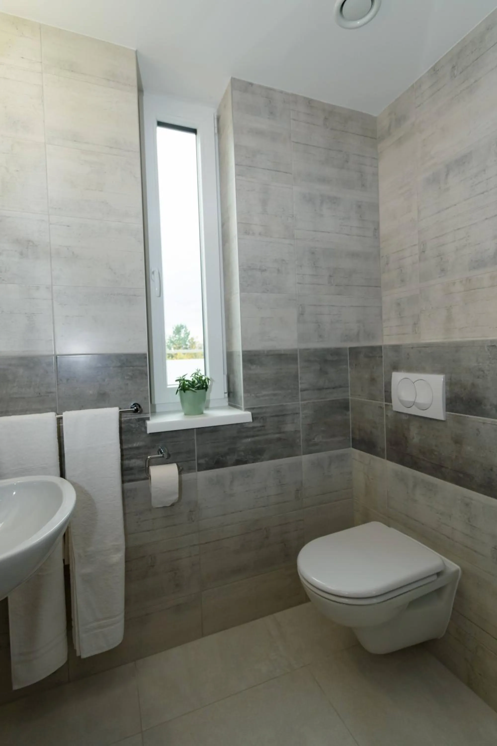 Toilet in Solid Gold Garni Hotel