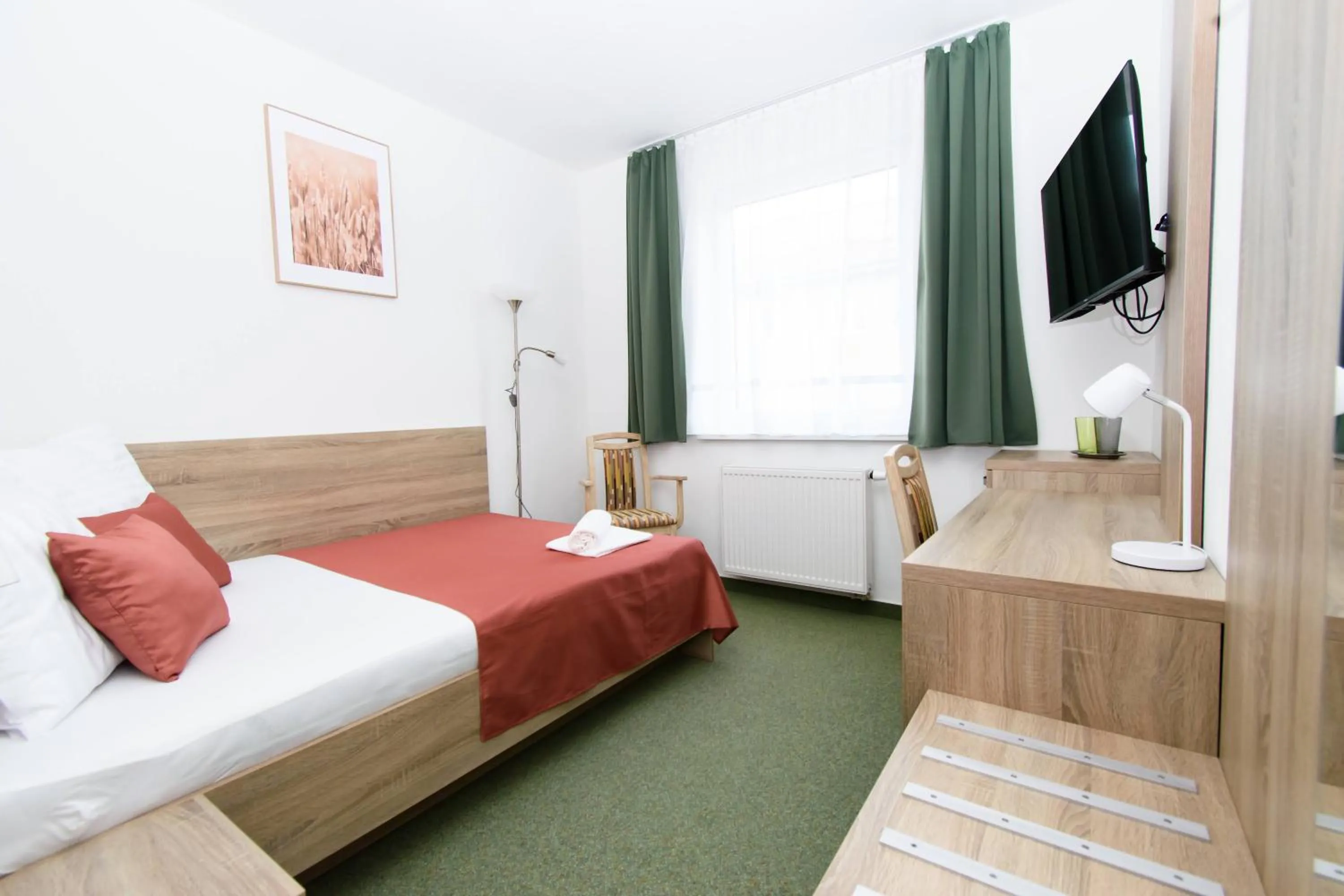 Bed in Solid Gold Garni Hotel