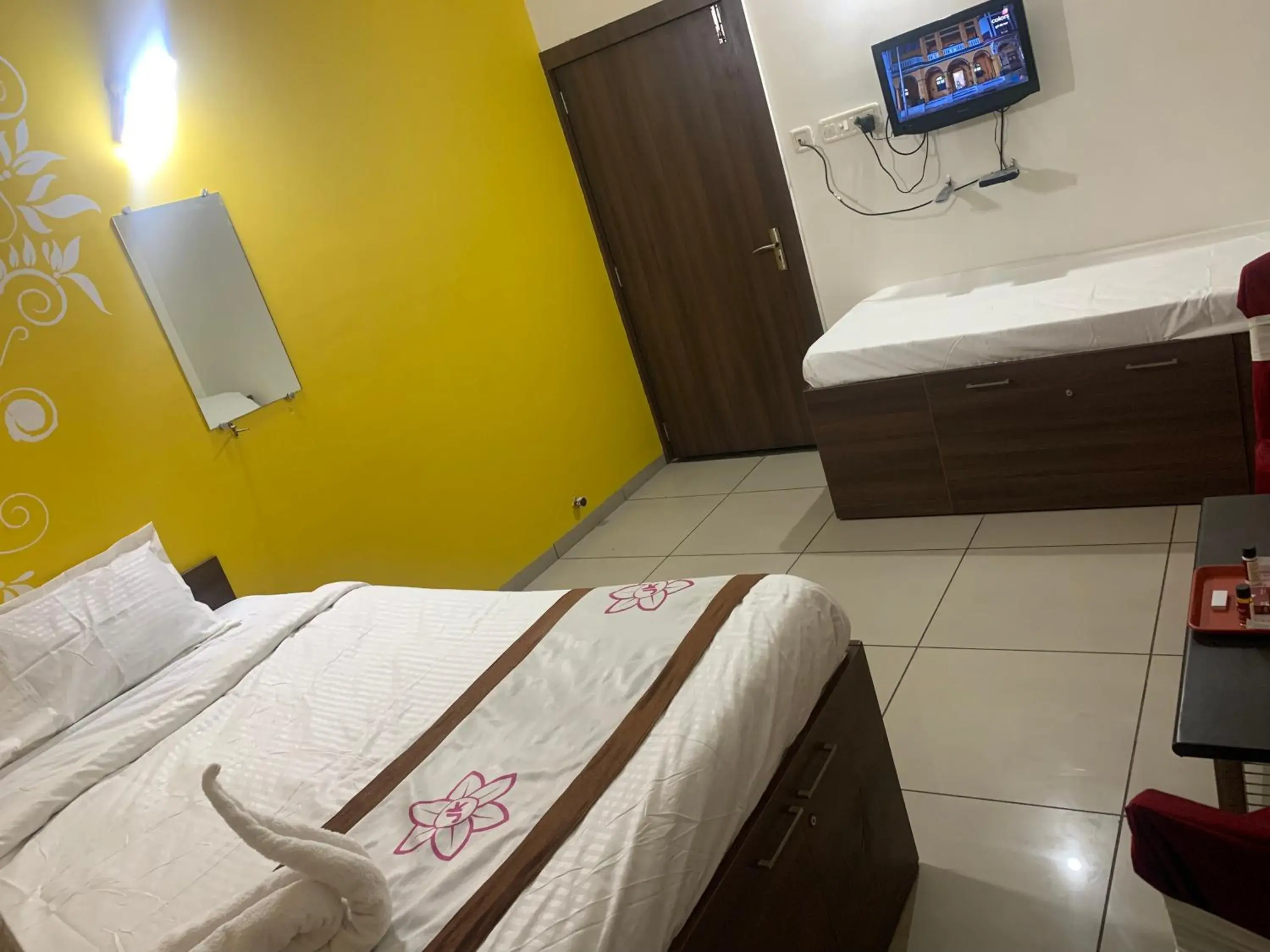 Economy Triple Room with Shared Bathroom - single occupancy in Hotel JK Lions - Koradi, Nagpur Economy Triple Room with Shared Bathroom - single occupancy in Hotel JK Lions - Koradi, Nagpur