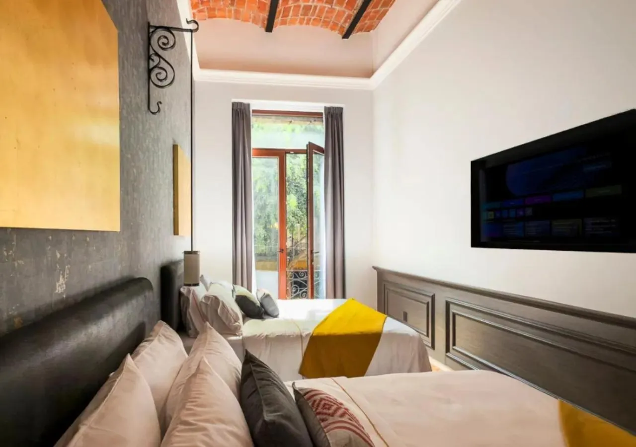 Bed in Hotel Bellas Artes