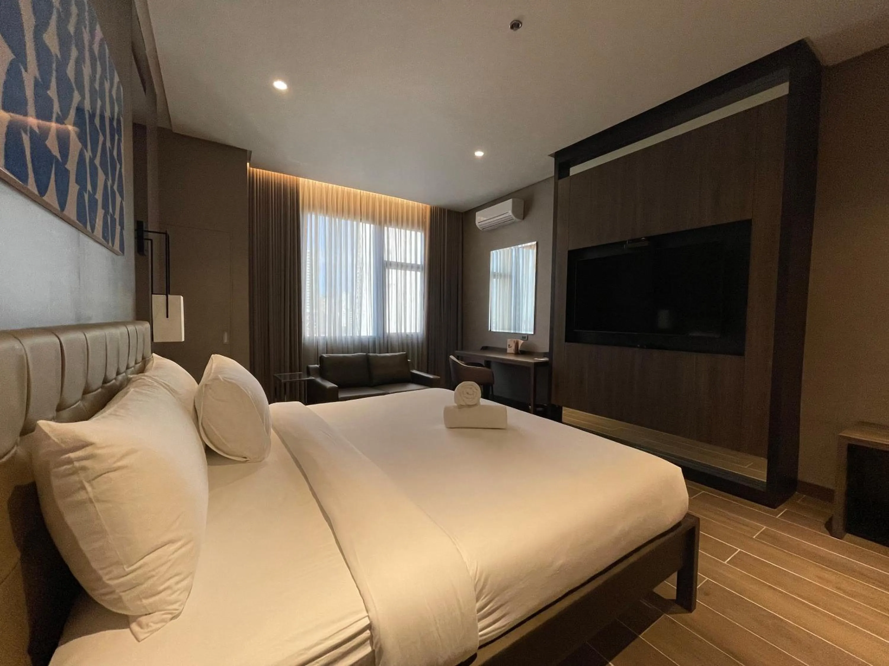 Photo of the whole room, Bed in Hotel A and A Quezon City powered by Cocotel