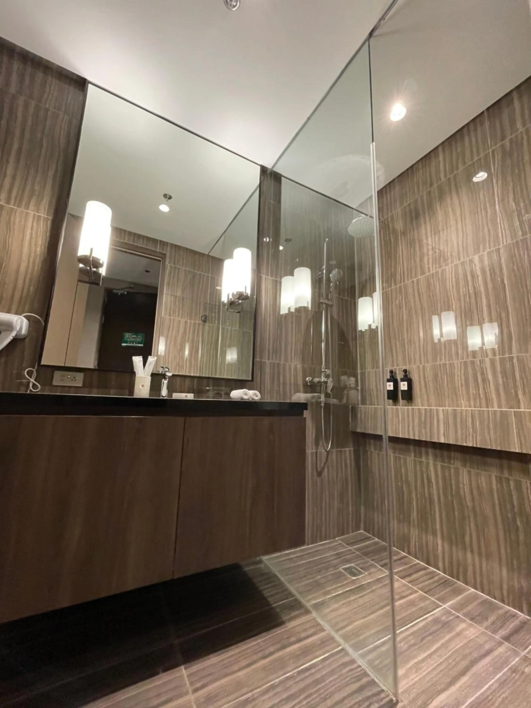 Bathroom in Hotel A and A Quezon City powered by Cocotel