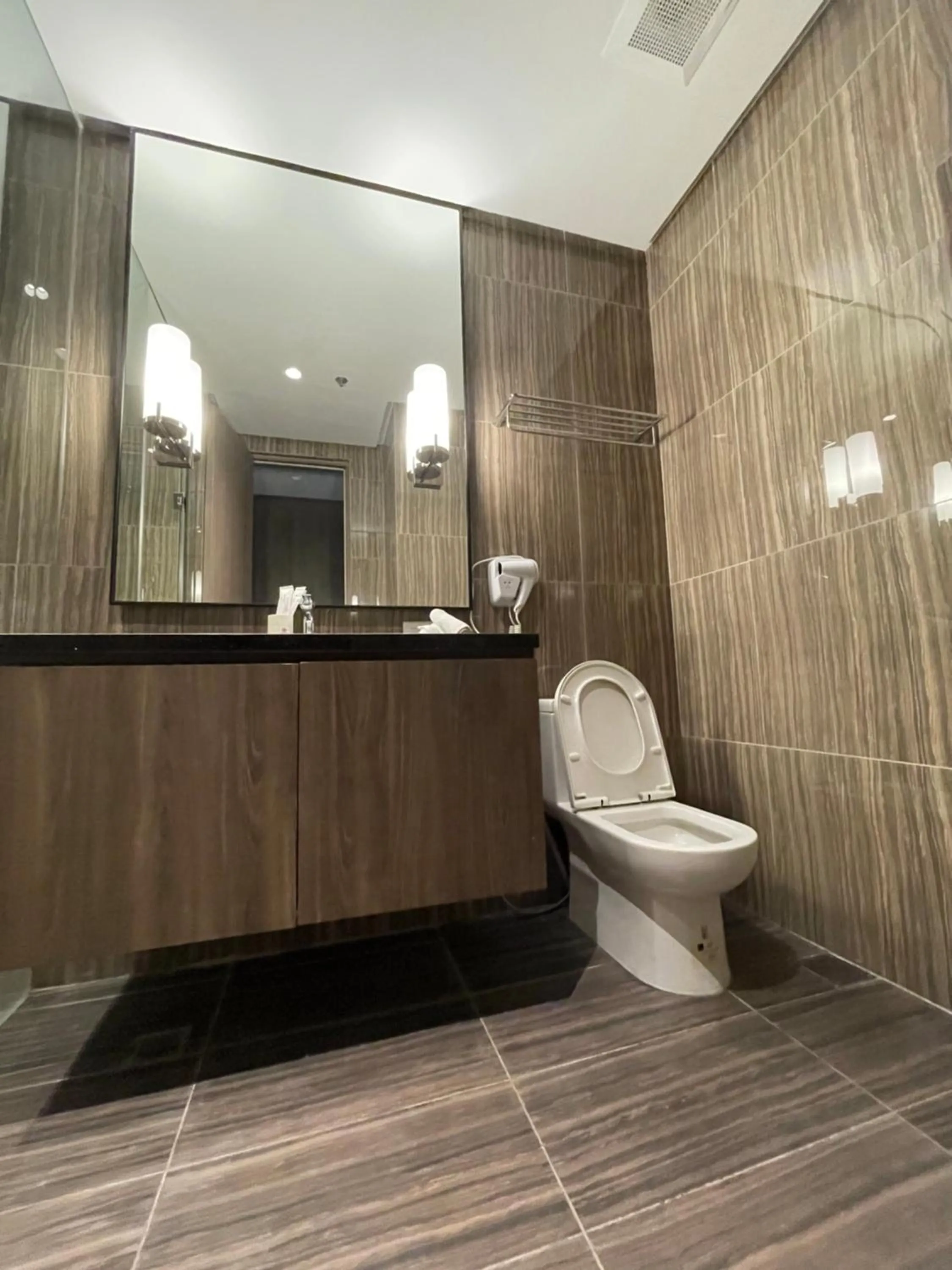 Bathroom in Hotel A and A Quezon City powered by Cocotel