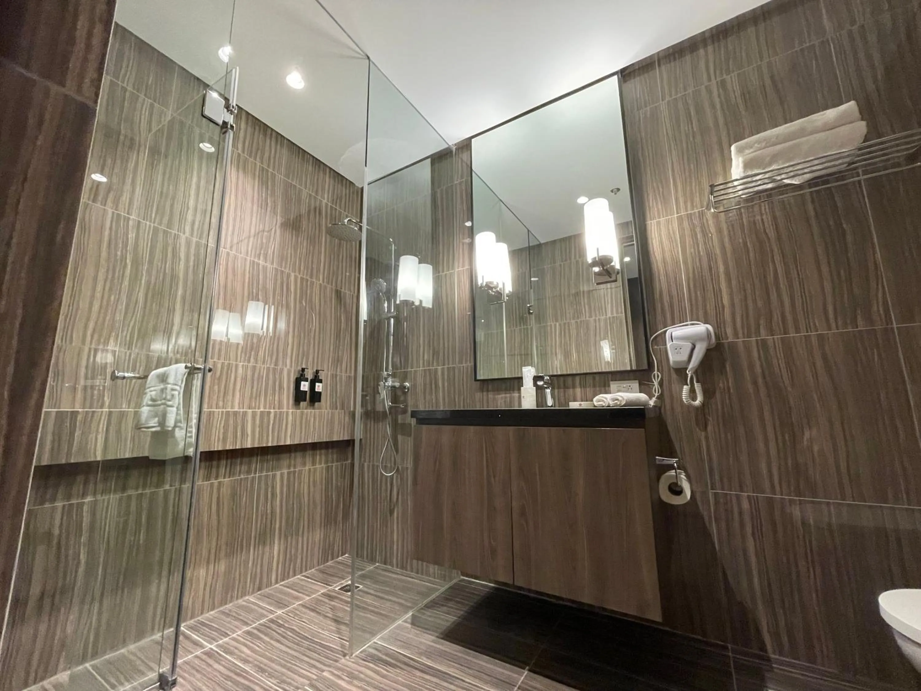 Bathroom in Hotel A and A Quezon City powered by Cocotel