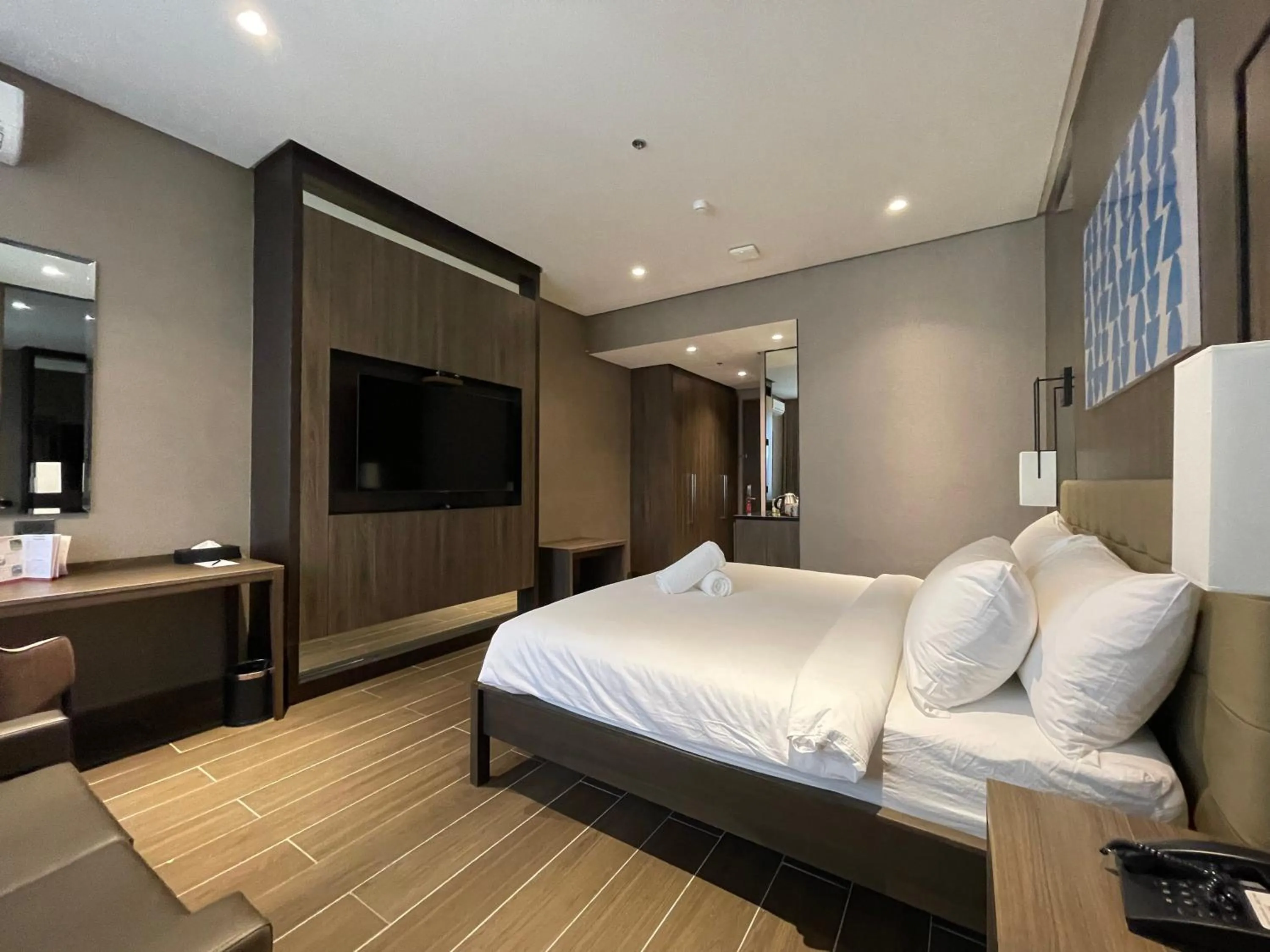 Photo of the whole room, Bed in Hotel A and A Quezon City powered by Cocotel