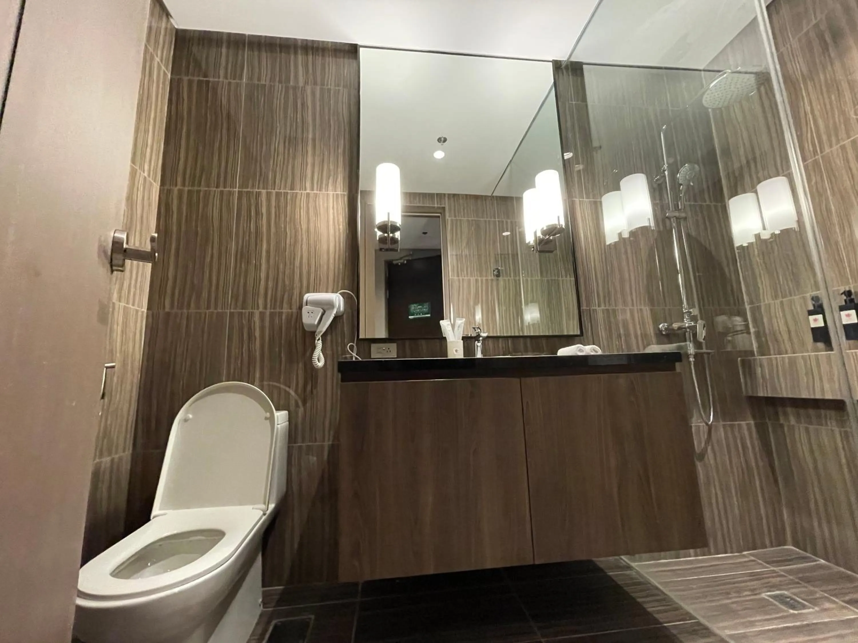 Bathroom in Hotel A and A Quezon City powered by Cocotel