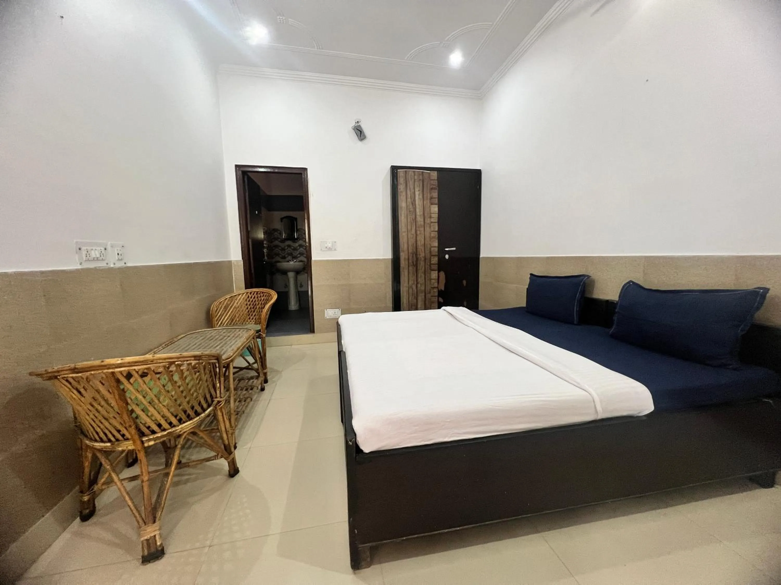 Bed in Tulsi Cottage