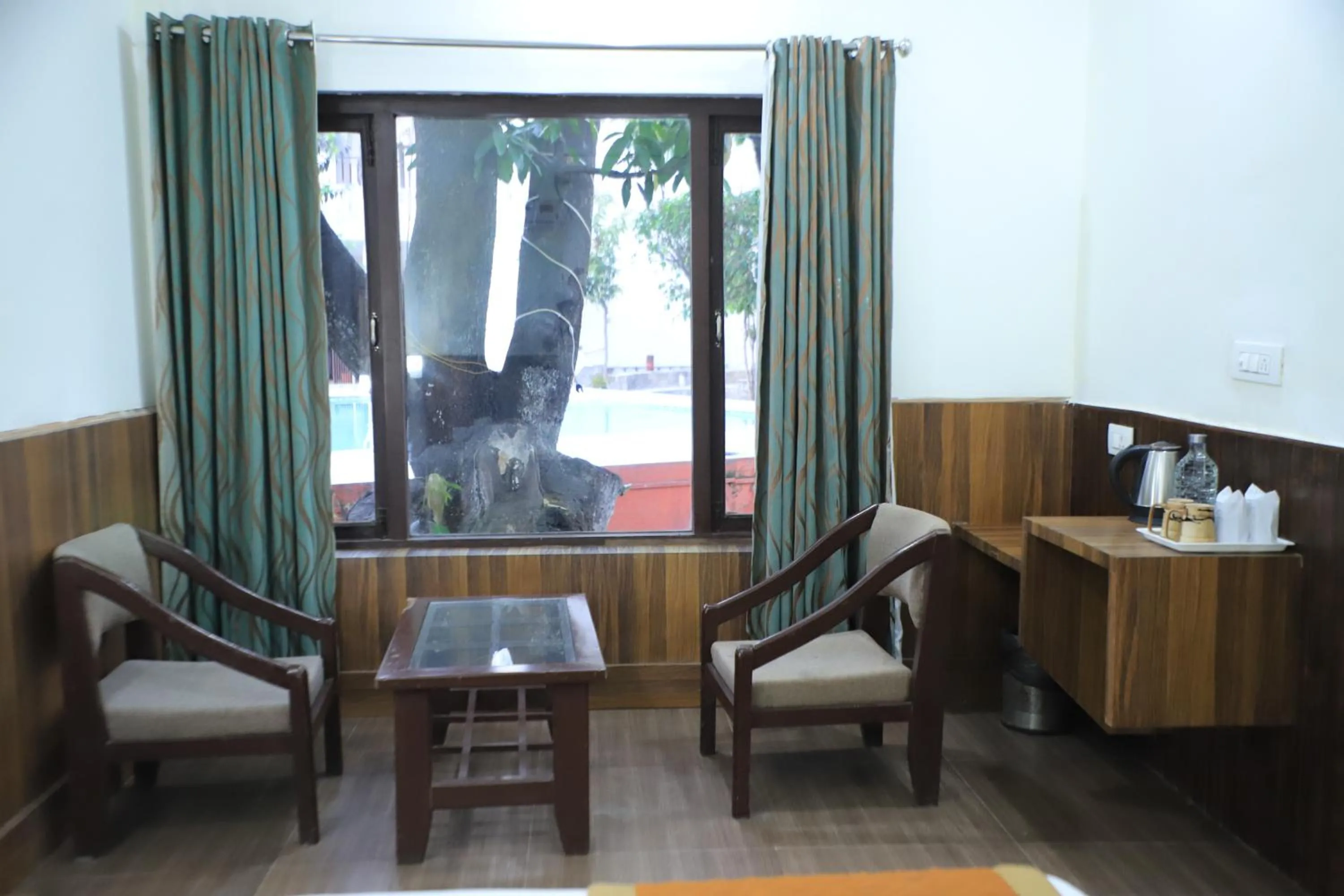 Seating area in Corbett Paradiso Resort Dikhuli