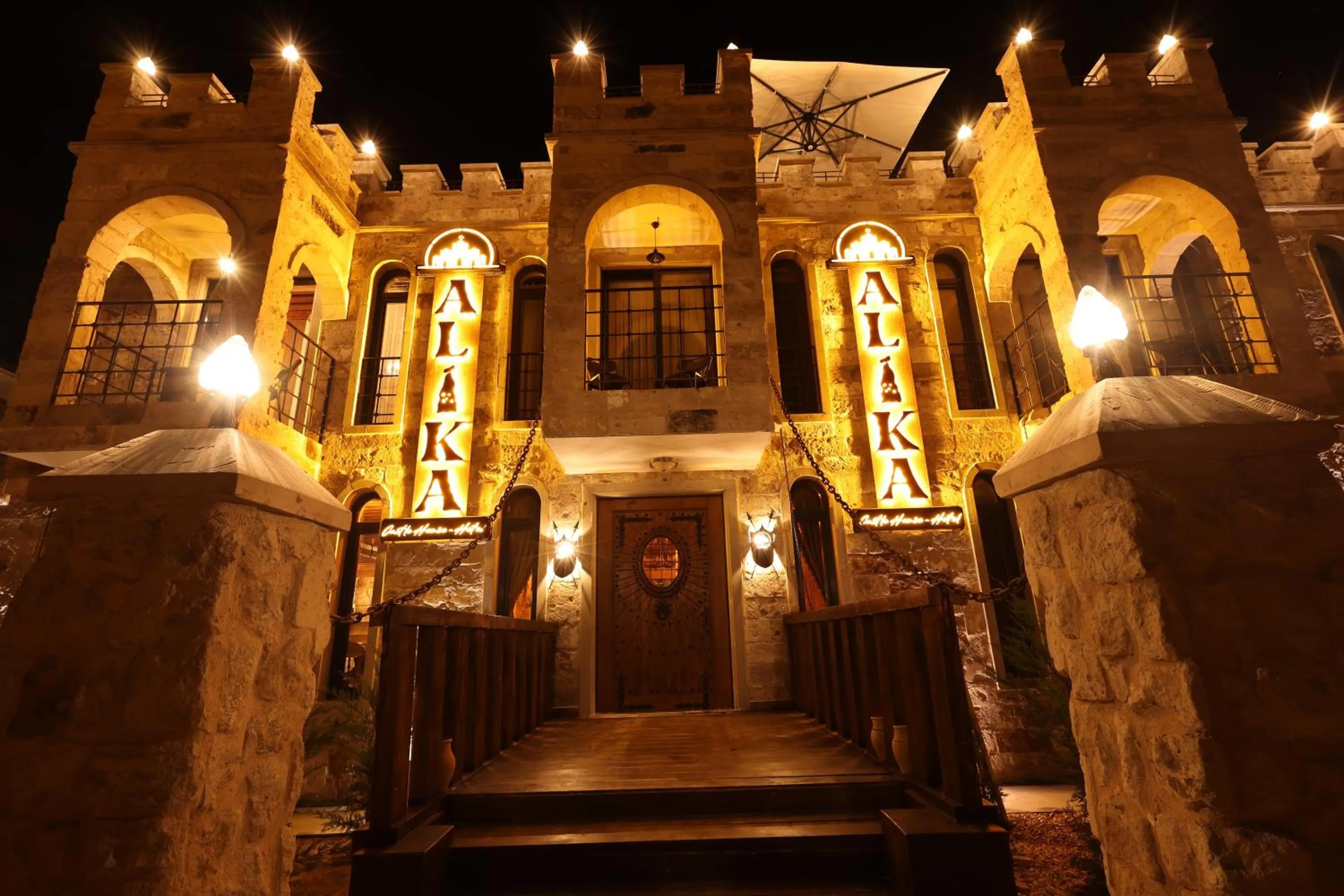 Property logo or sign in Alika Castle House