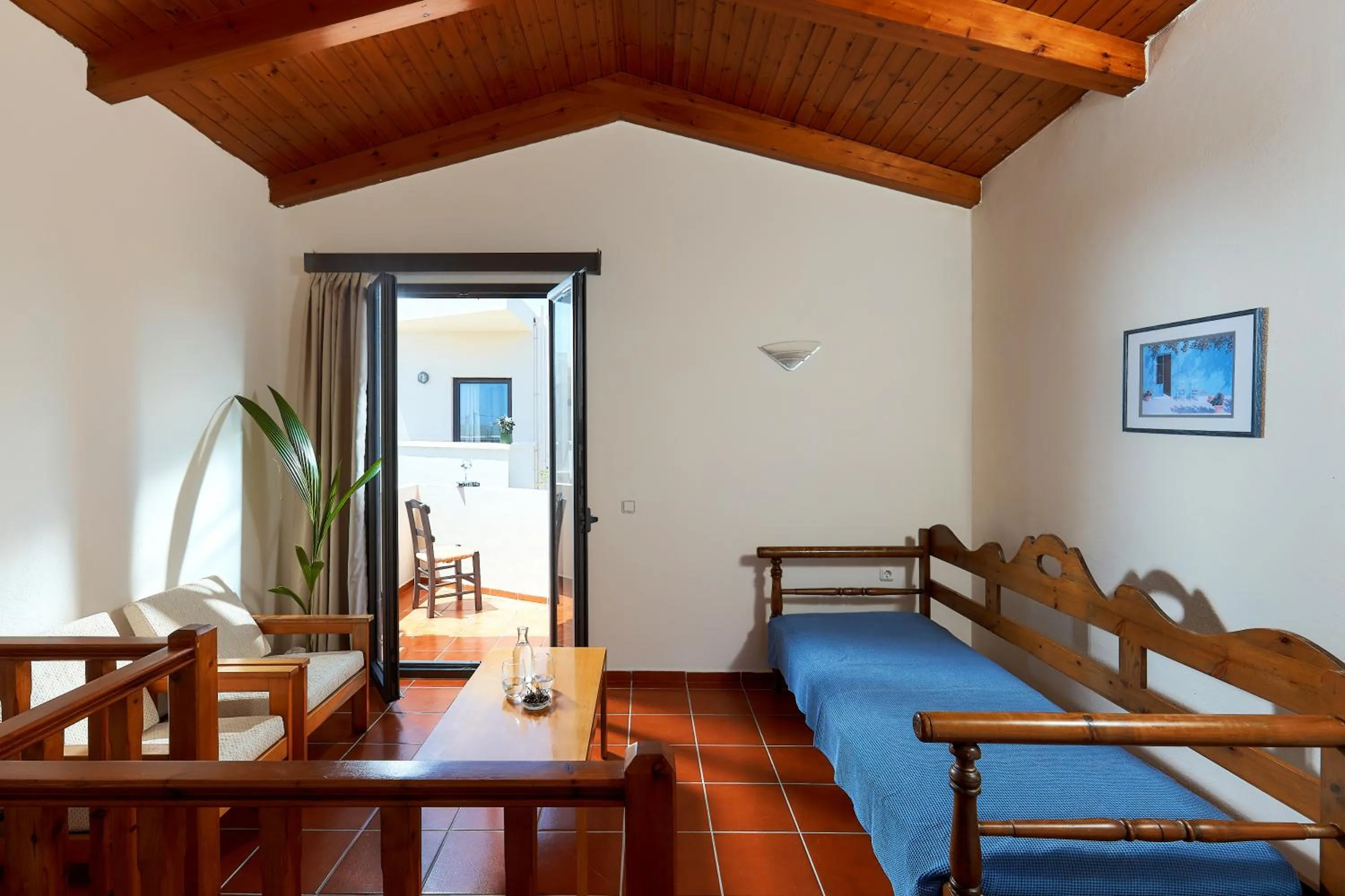 Bed in Creteco Hotel & Suites