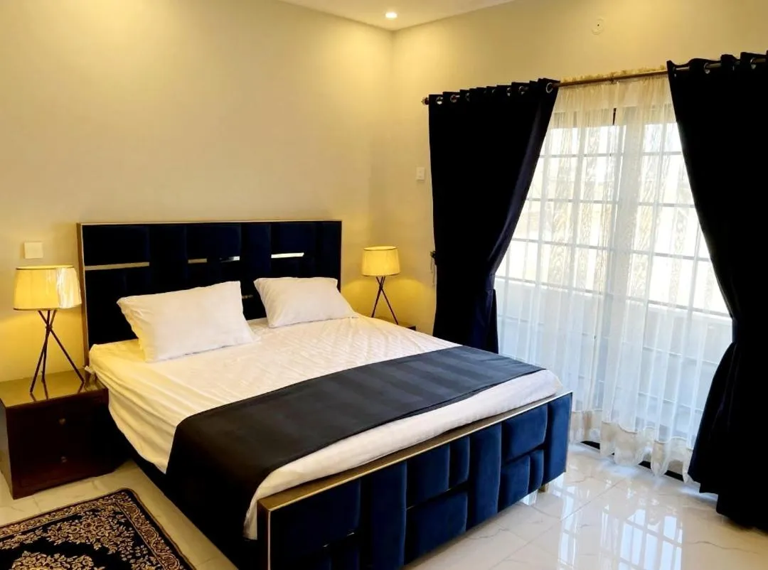 Bed in Riwayat Guest House