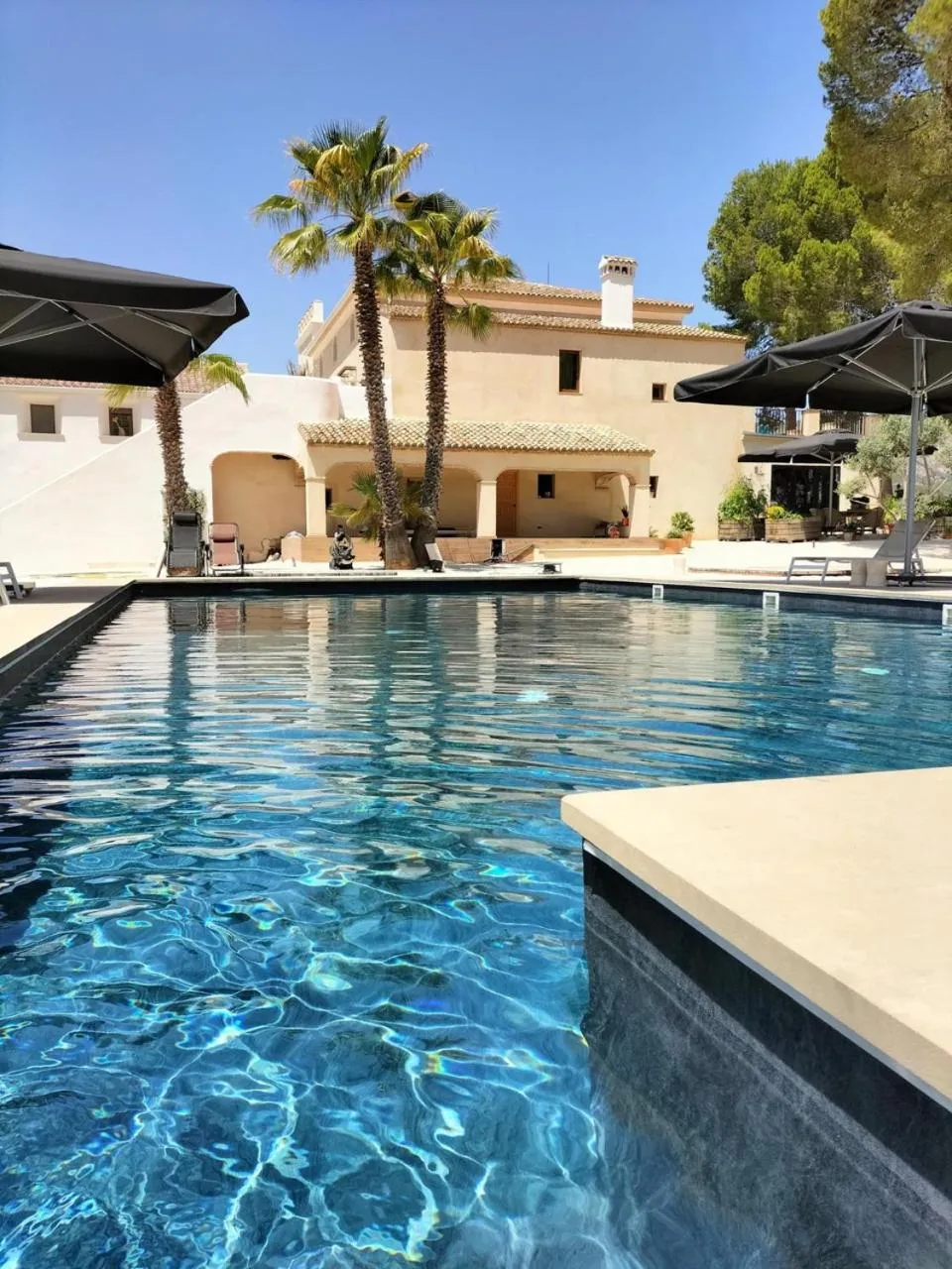 Pool view in Hotel Finca La Mixtura, Restaurant Mélange
