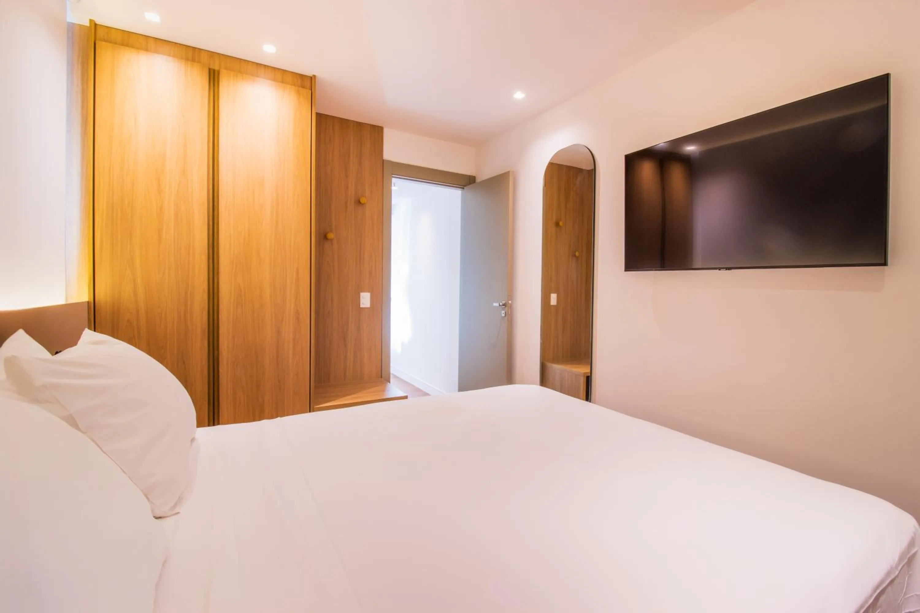 Bed in Anna Suites Arpoador