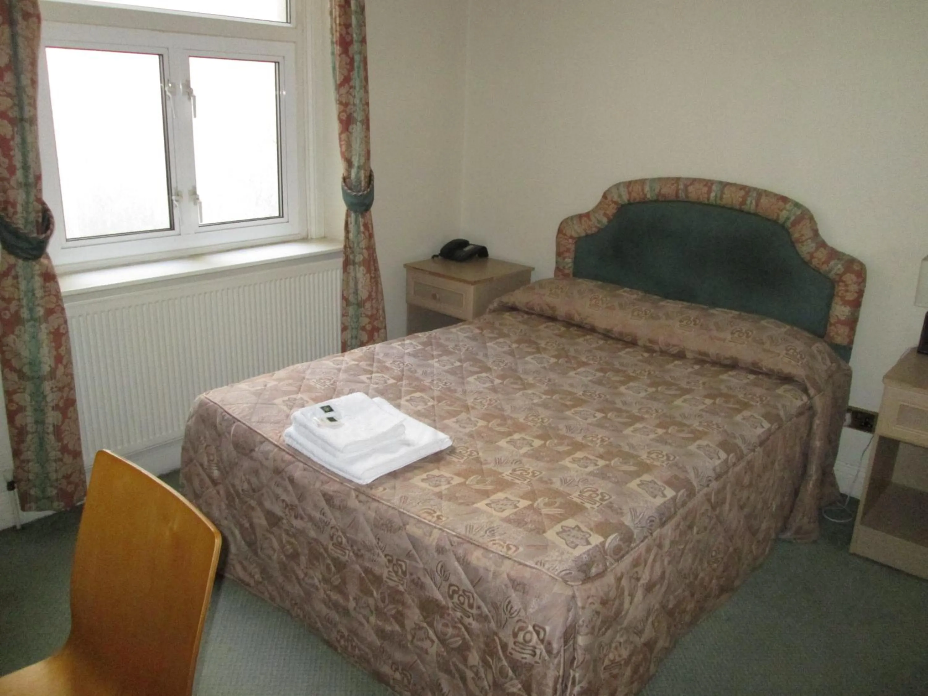 Bed in The Brompton Hotel