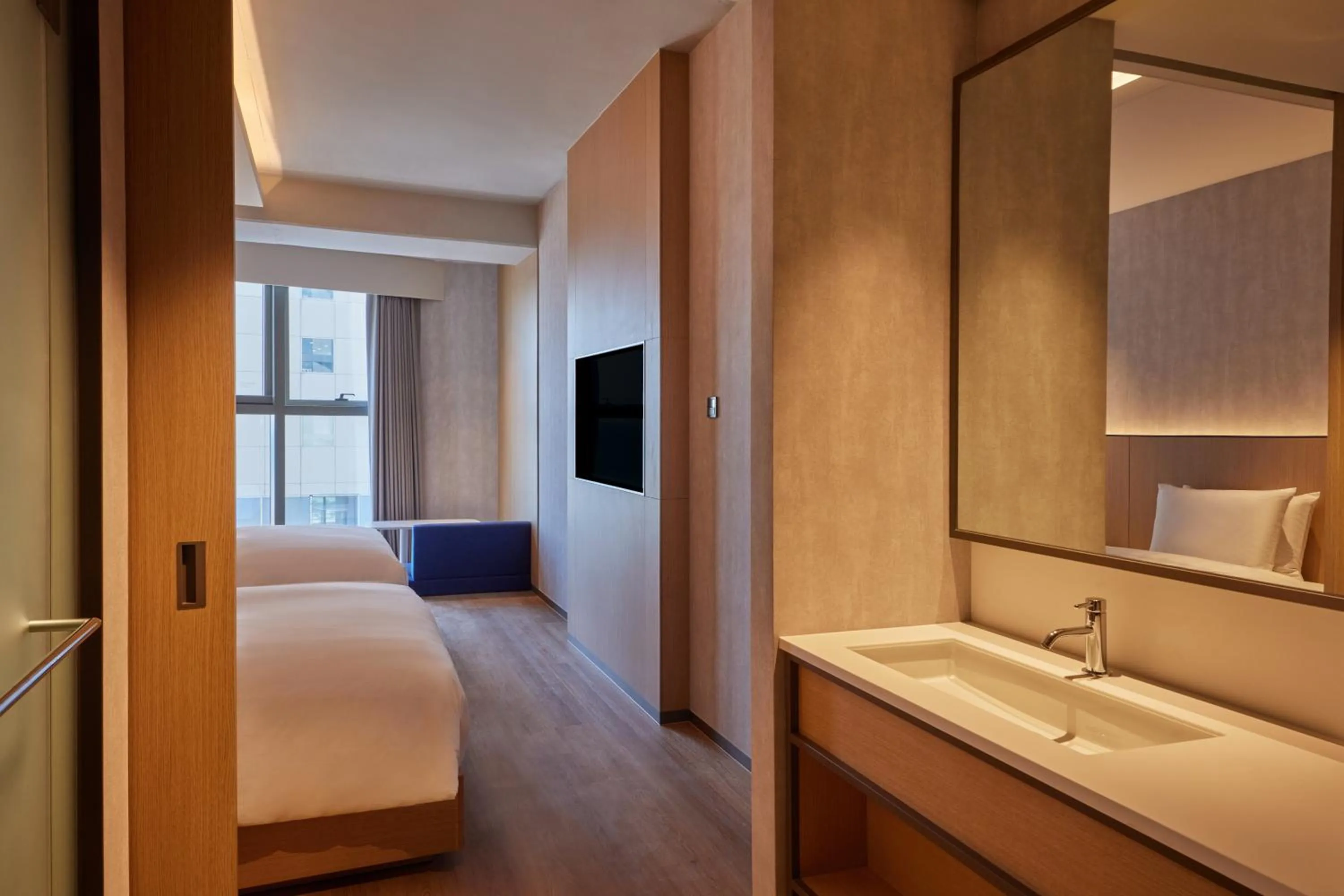 Bed in L7 HAEUNDAE by LOTTE HOTELS