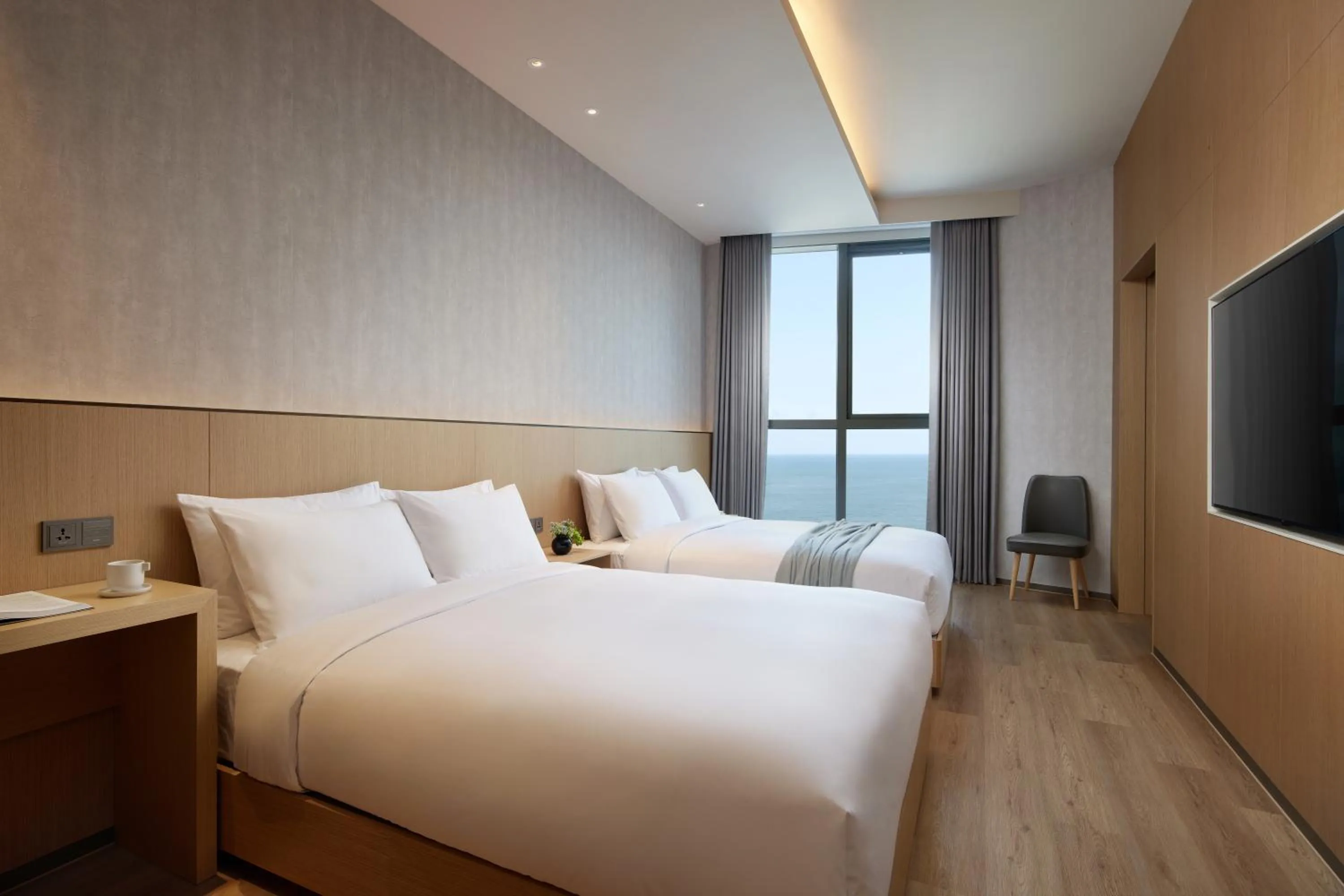 Bed in L7 HAEUNDAE by LOTTE HOTELS