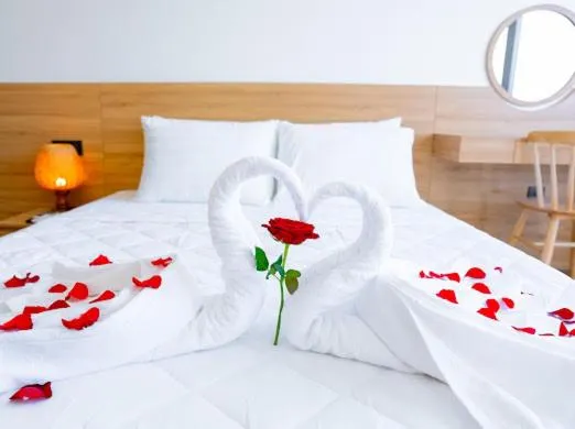 Bed in OSAKA BOUTIQUE PHAN THIET HOTEL