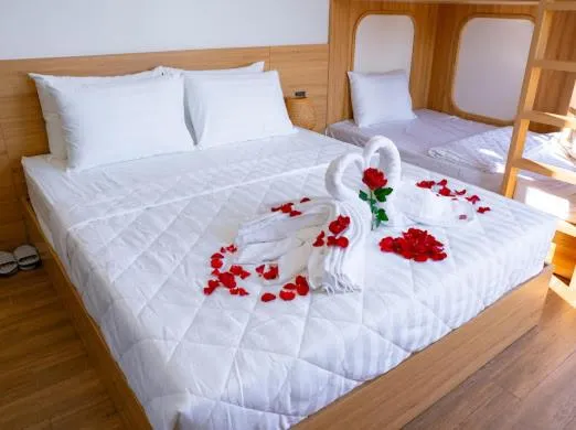 Bed in OSAKA BOUTIQUE PHAN THIET HOTEL