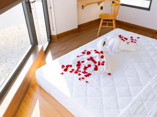 Bed in OSAKA BOUTIQUE PHAN THIET HOTEL