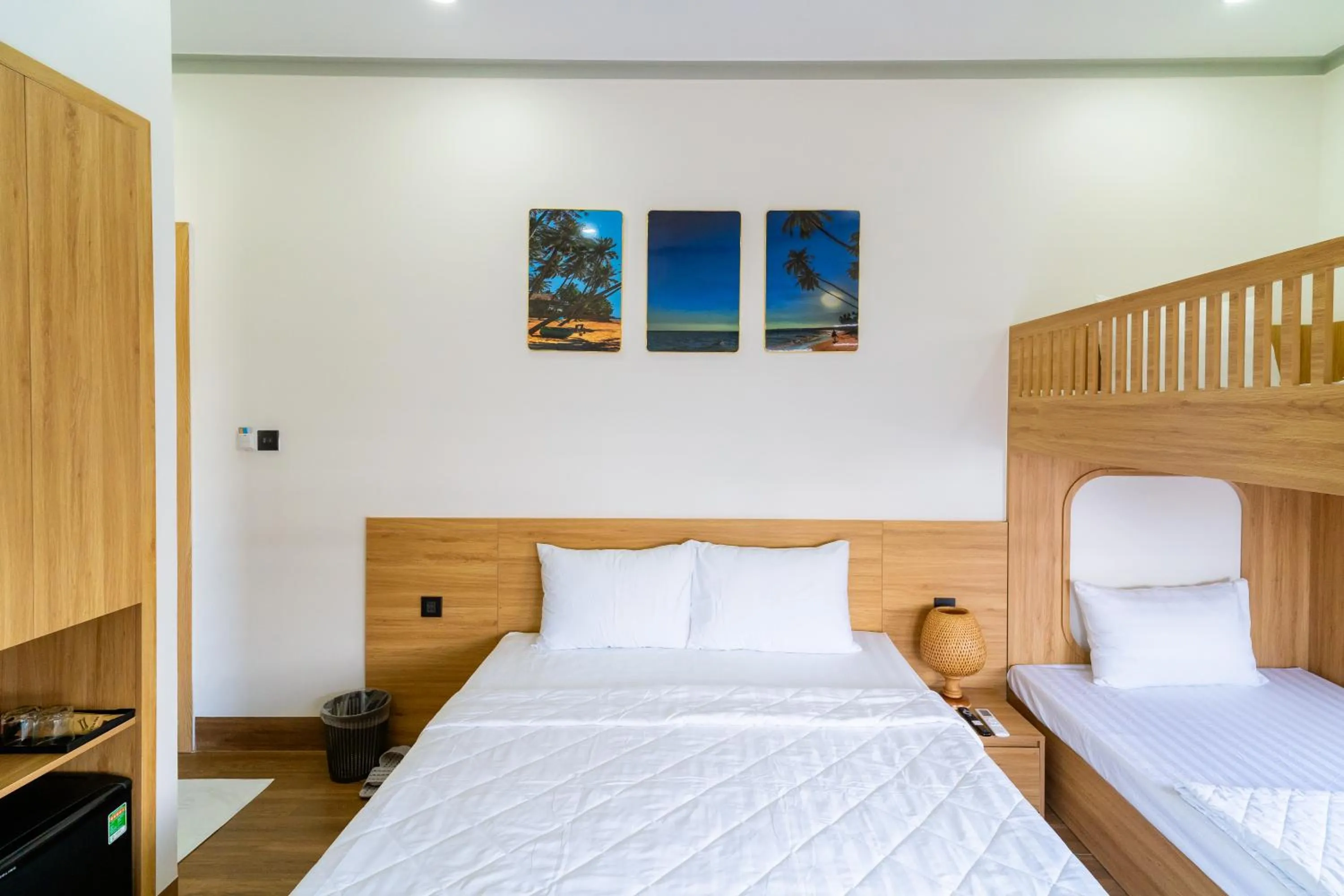 Bed in OSAKA BOUTIQUE PHAN THIET HOTEL