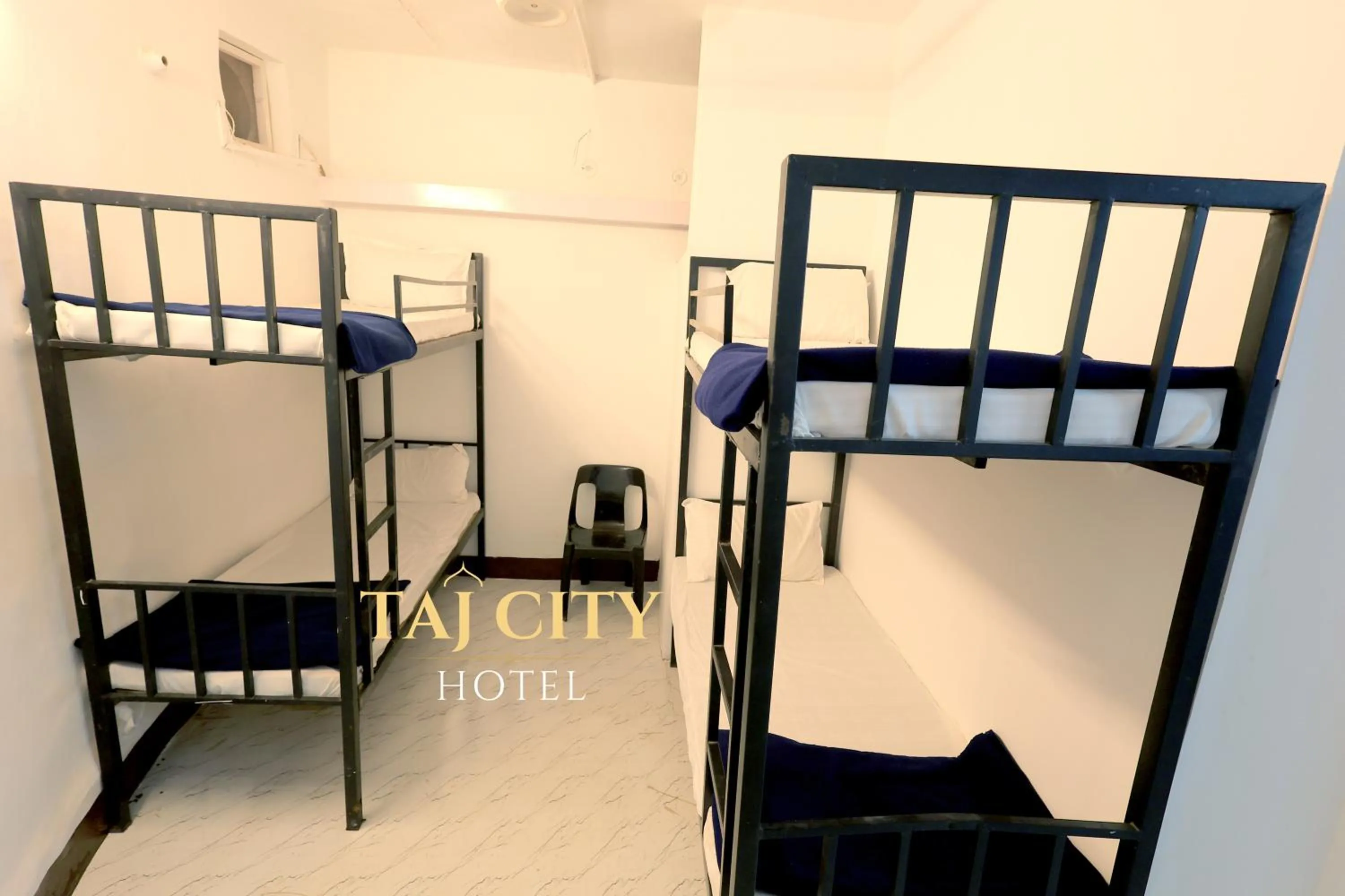 Bed in Taj City Hotel