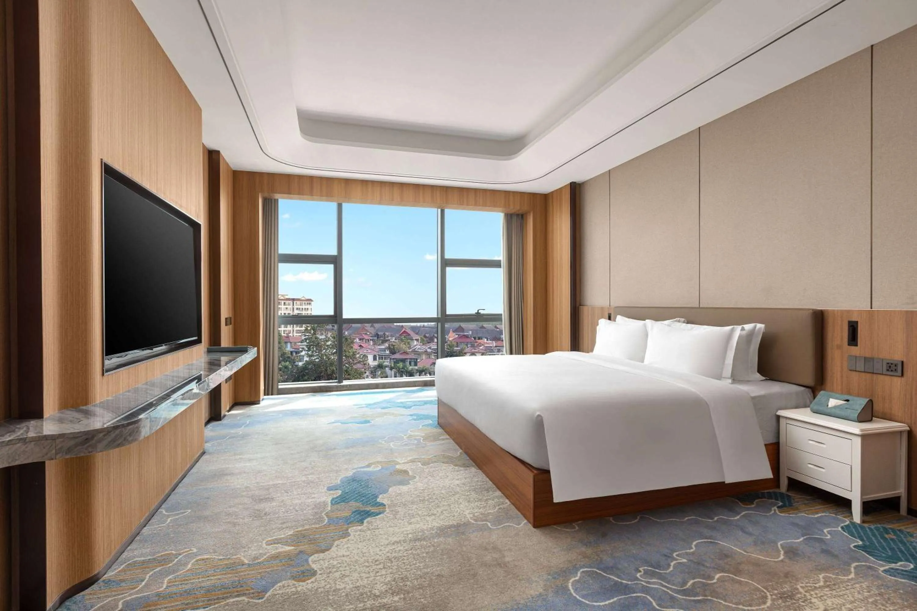 Photo of the whole room, Bed in Wyndham Xishuangbanna Qingquan