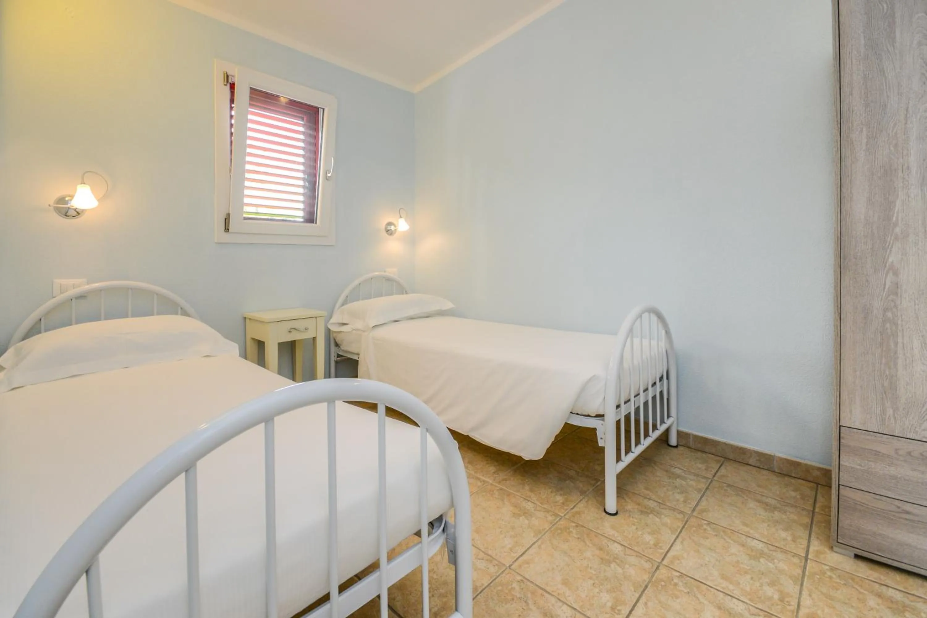 Bed in VILLA GARUTI VILLAGE