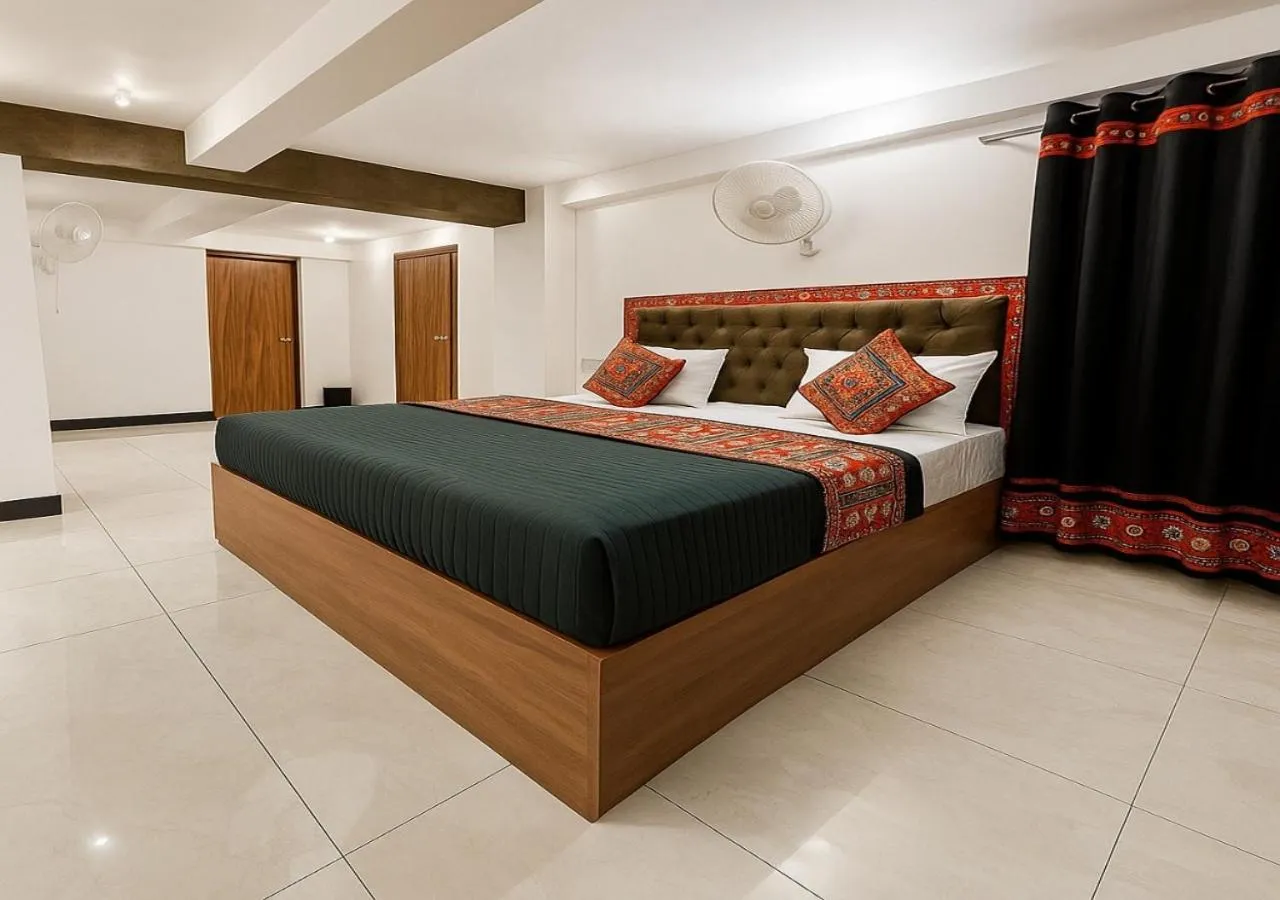 Bedroom, Bed in Stay Guru Usha Residency