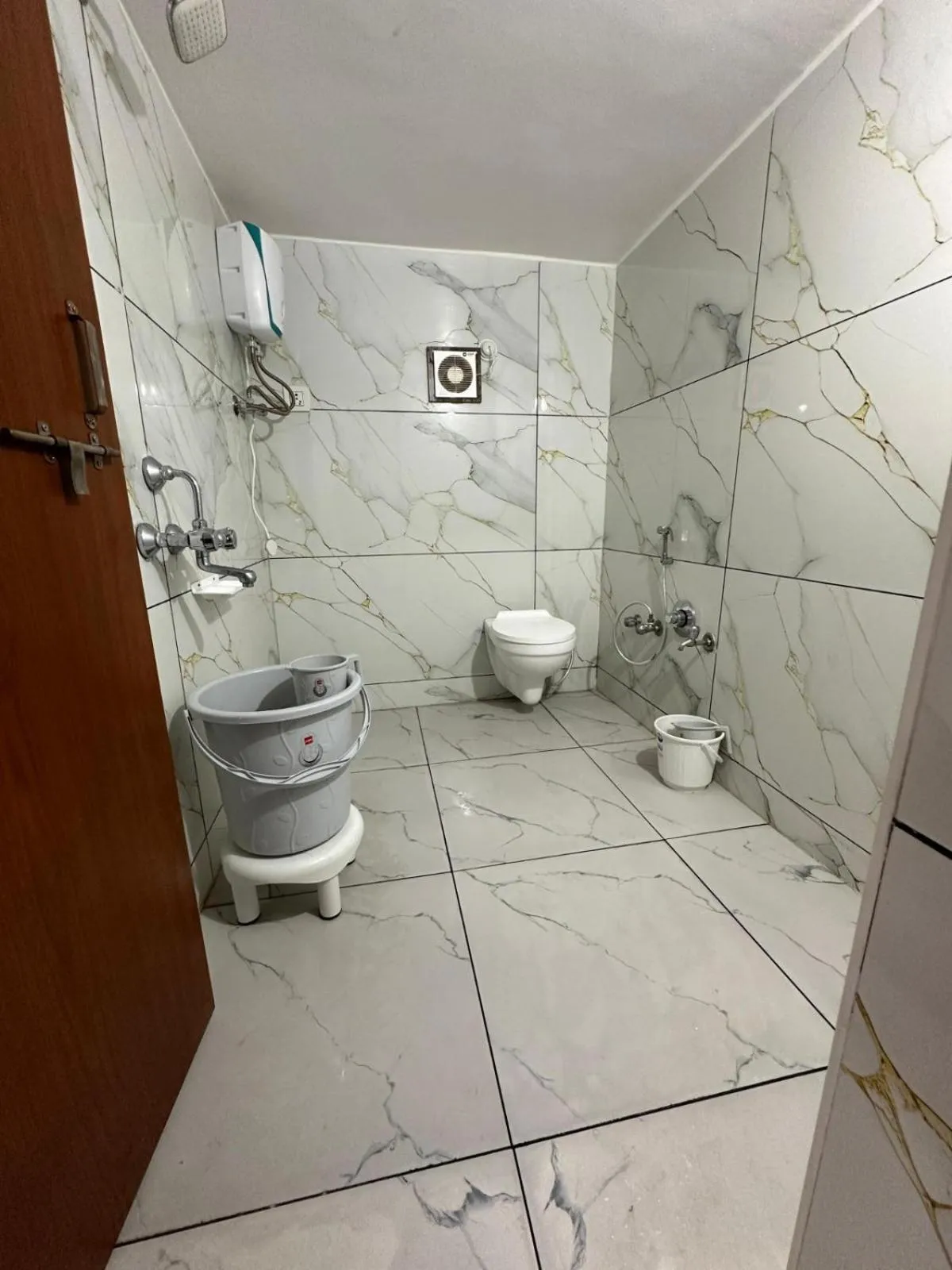 Bathroom in Stay Guru Usha Residency