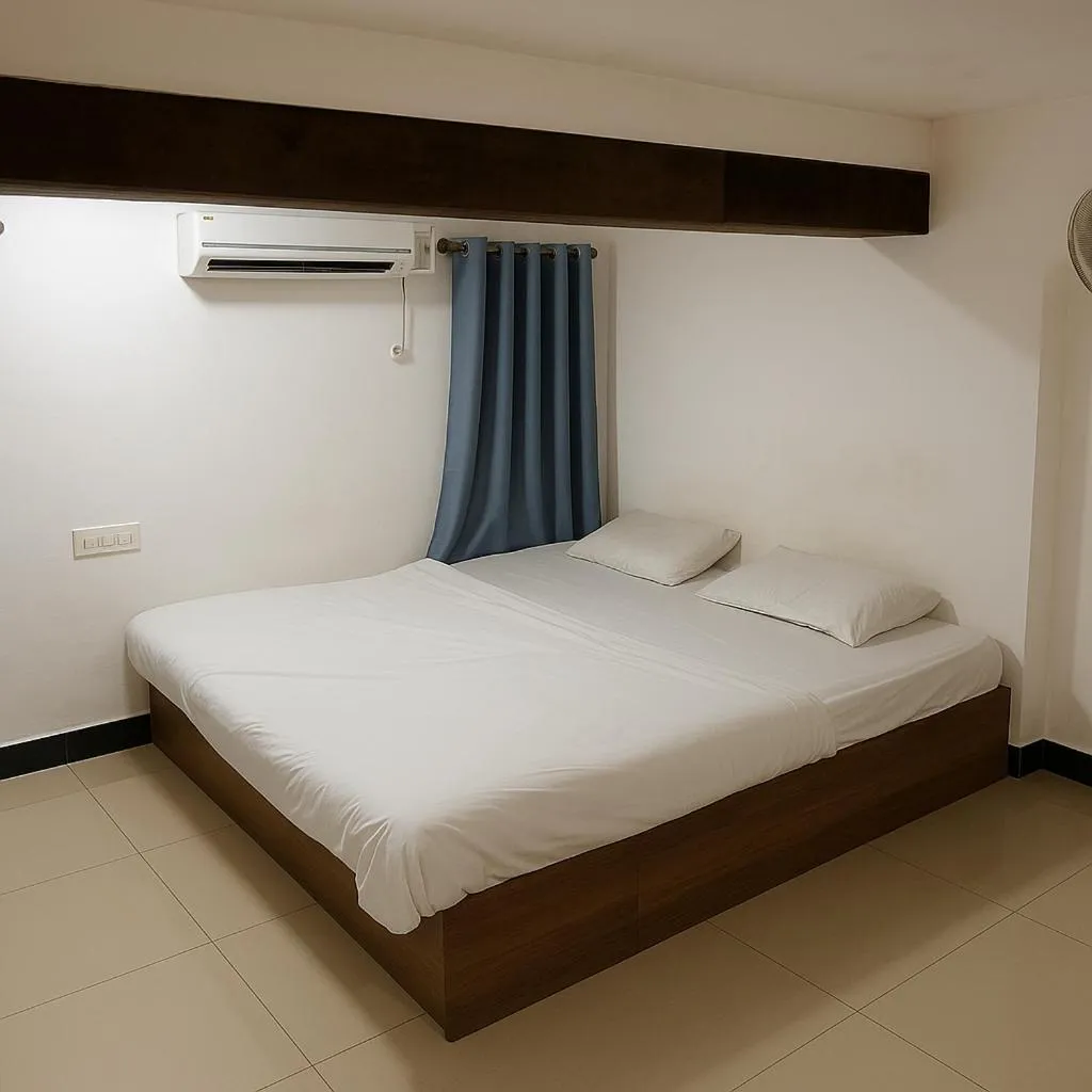 Bed in Stay Guru Usha Residency