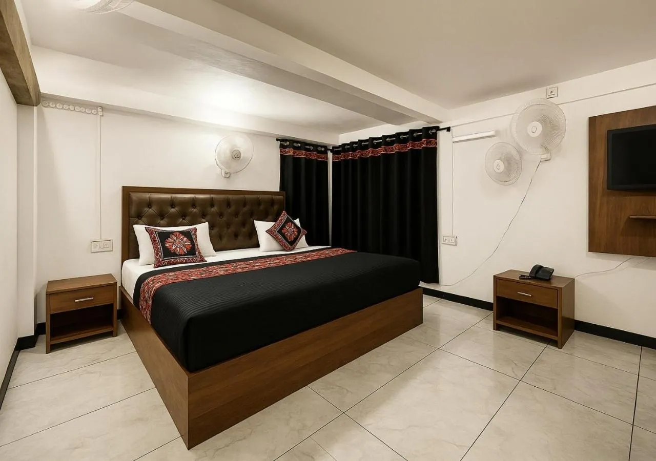 Bedroom, Bed in Stay Guru Usha Residency