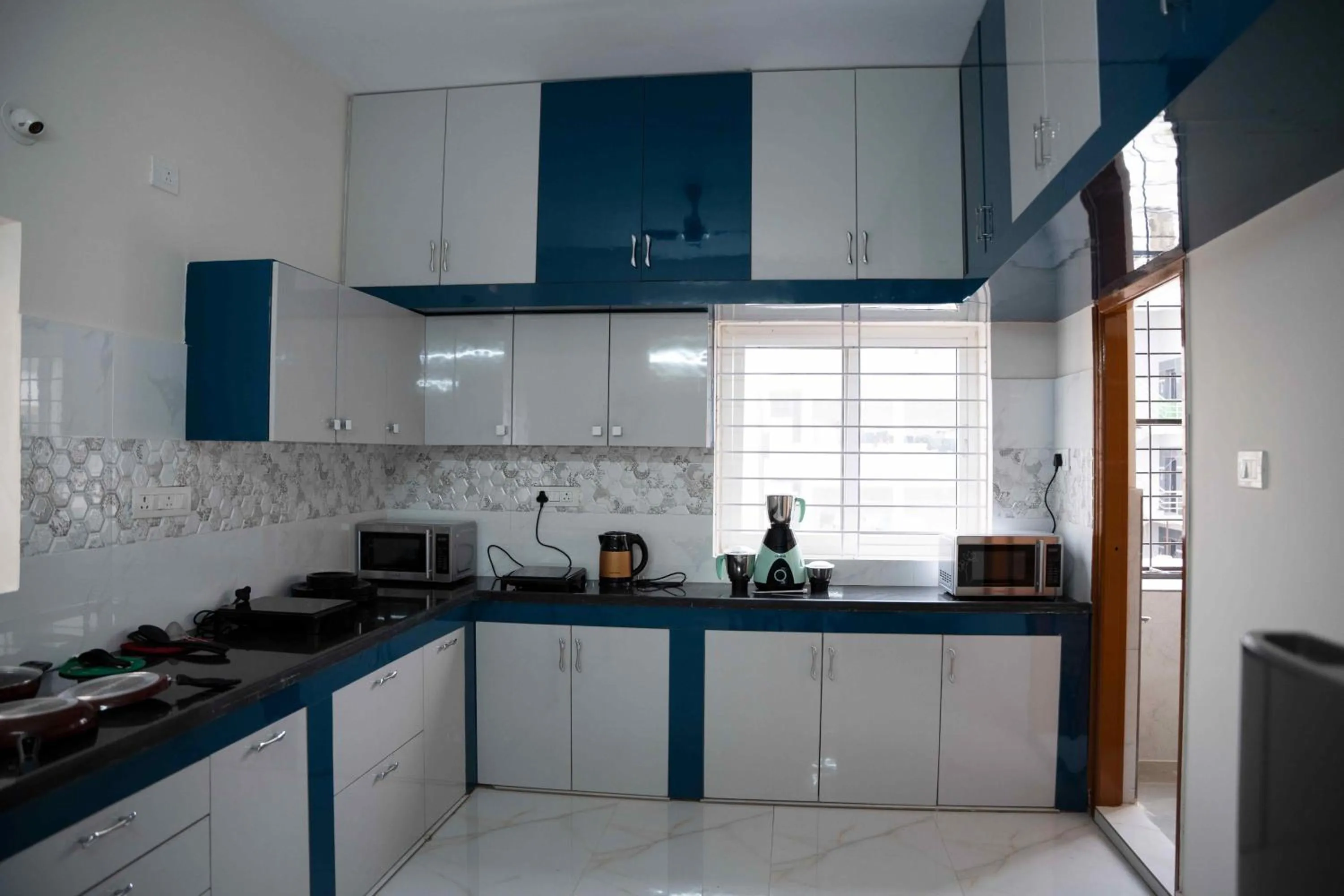 kitchen in Yellow Bells Serviced Apartments Hitech City
