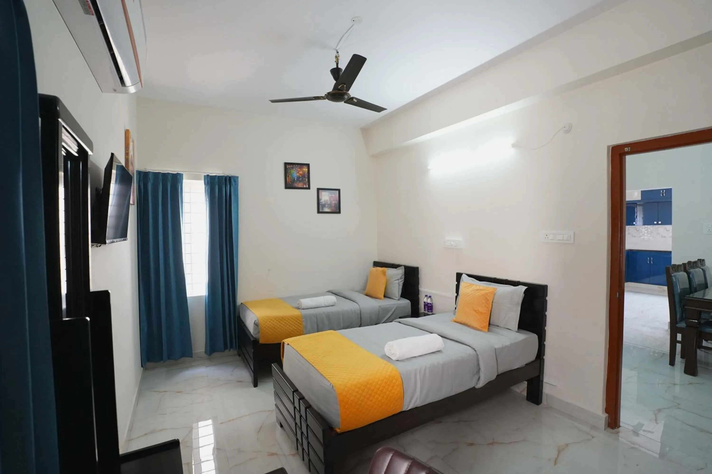 Bed in Yellow Bells Serviced Apartments Hitech City