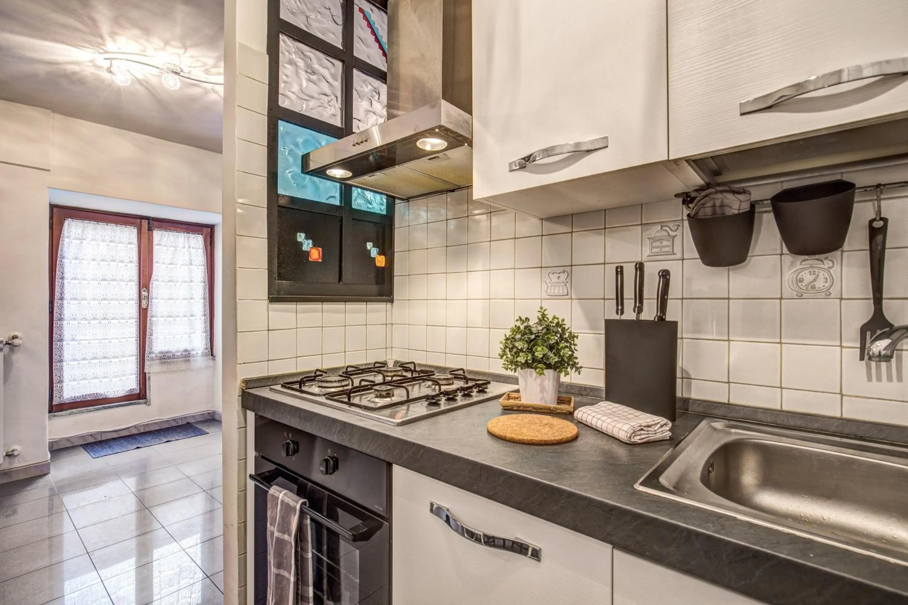 Kitchen or kitchenette in M&L Apartments - Ardesia Colosseo