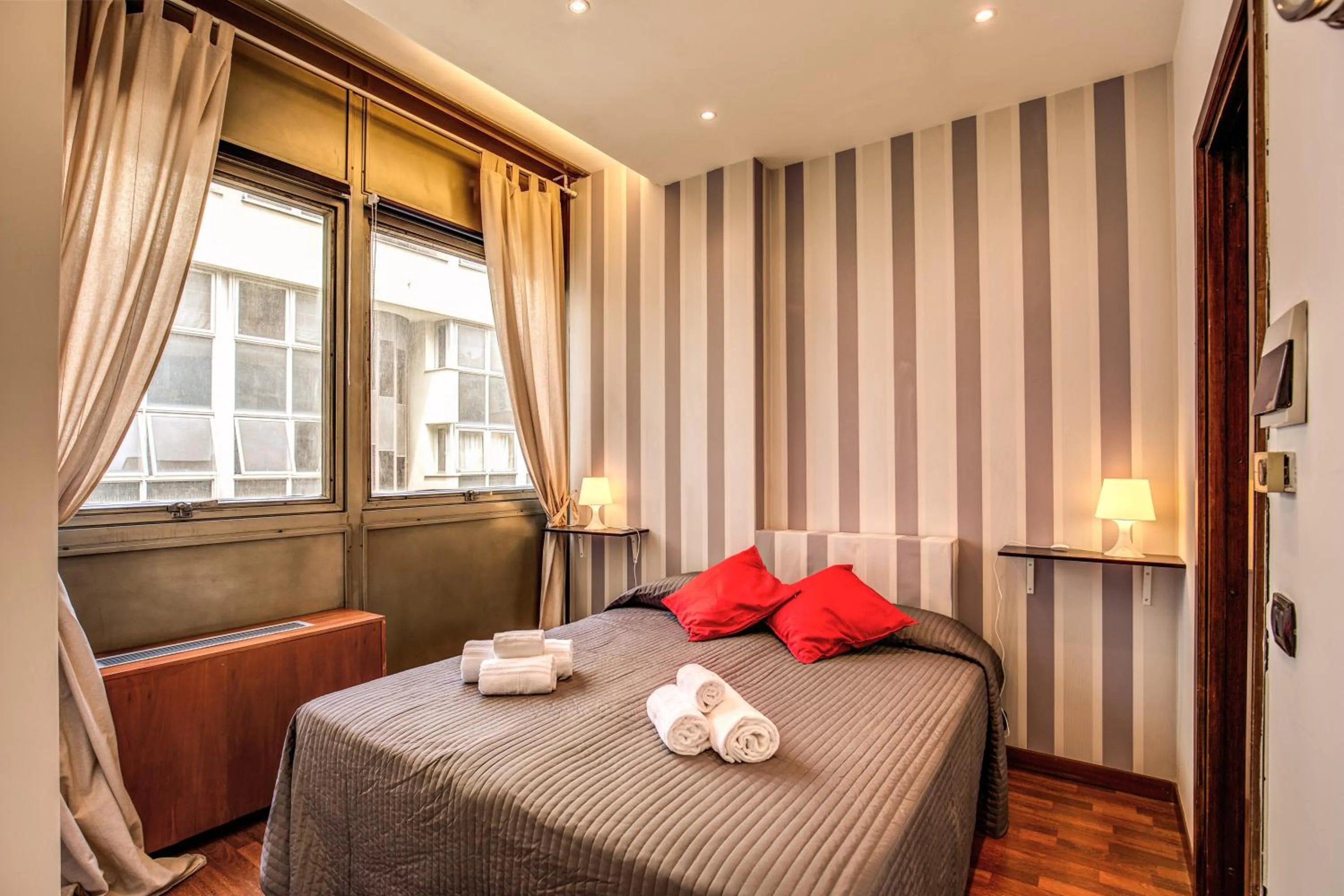 Bed in M&L Apartments - Ardesia Colosseo