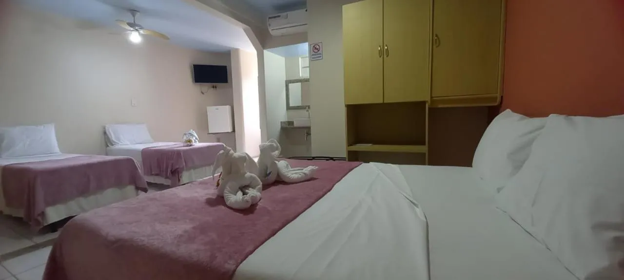 Bed in Pousada Recifes de Corais