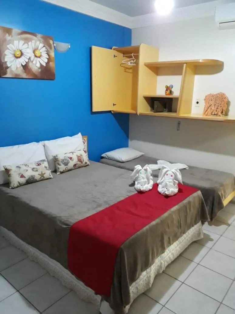 Bed in Pousada Recifes de Corais