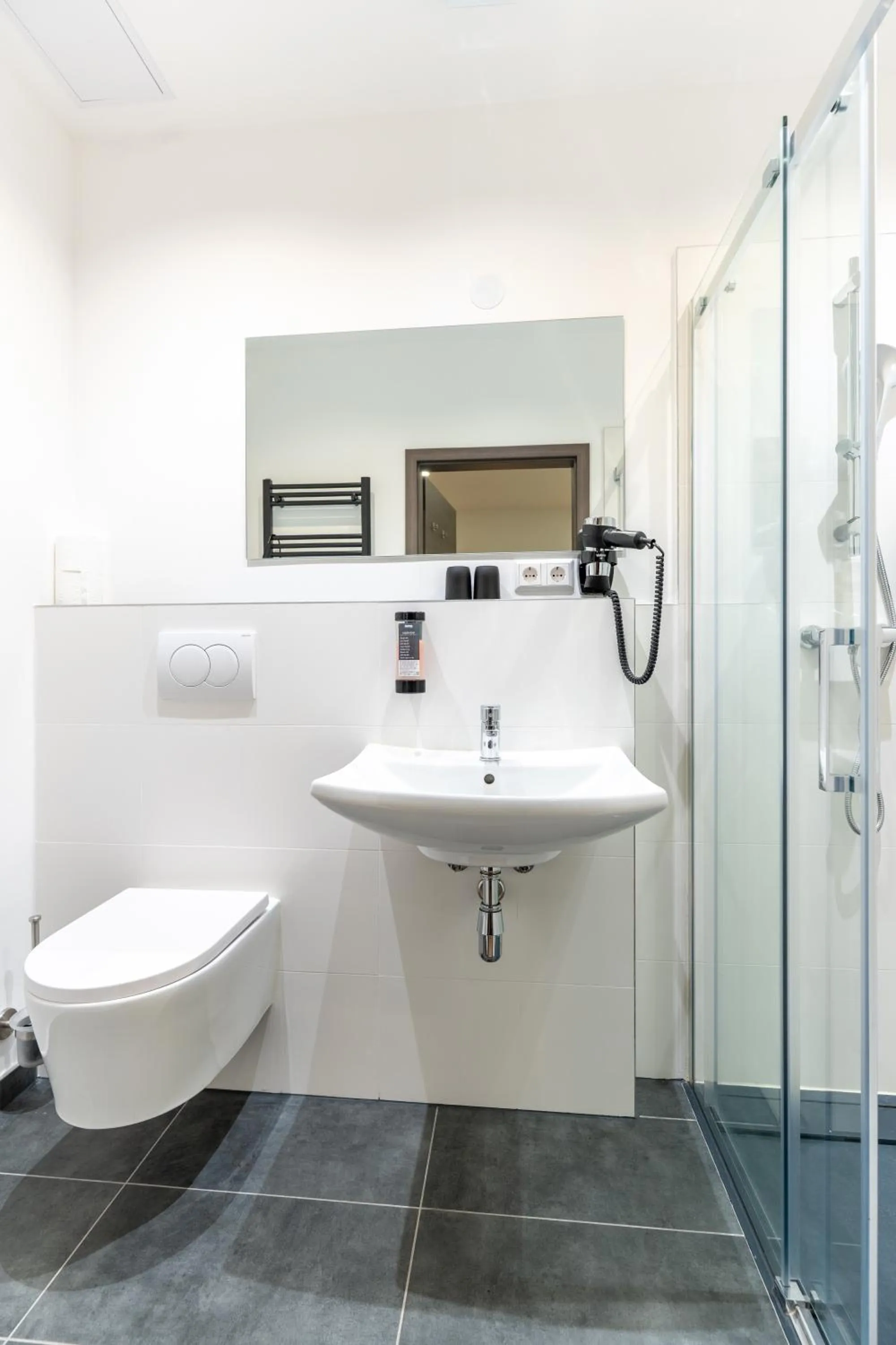 Shower in Chérisy Hotel Konstanz - Self Check-in Only