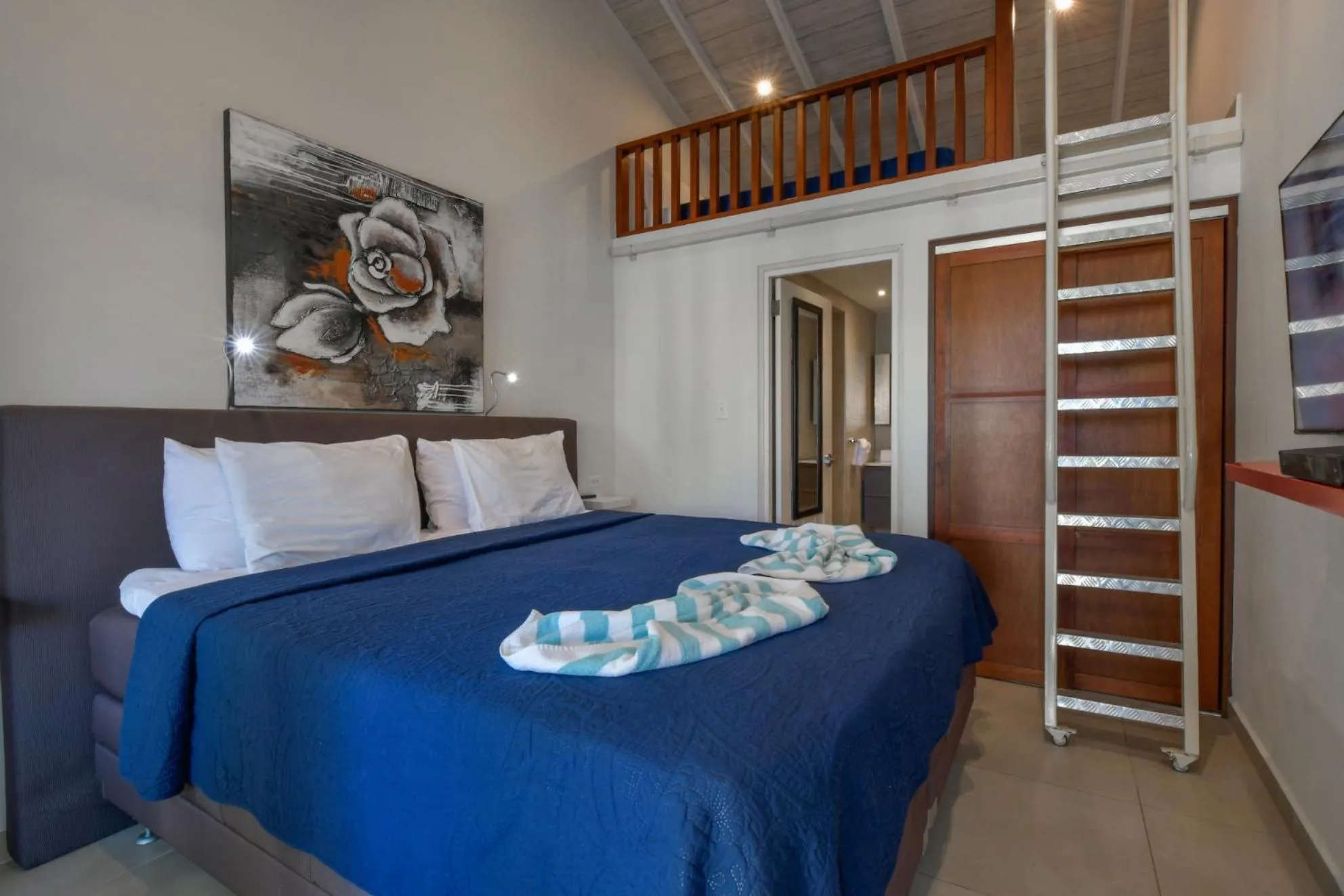 Bed in Boutique Hotel Swiss Paradise Aruba Villas and Suites