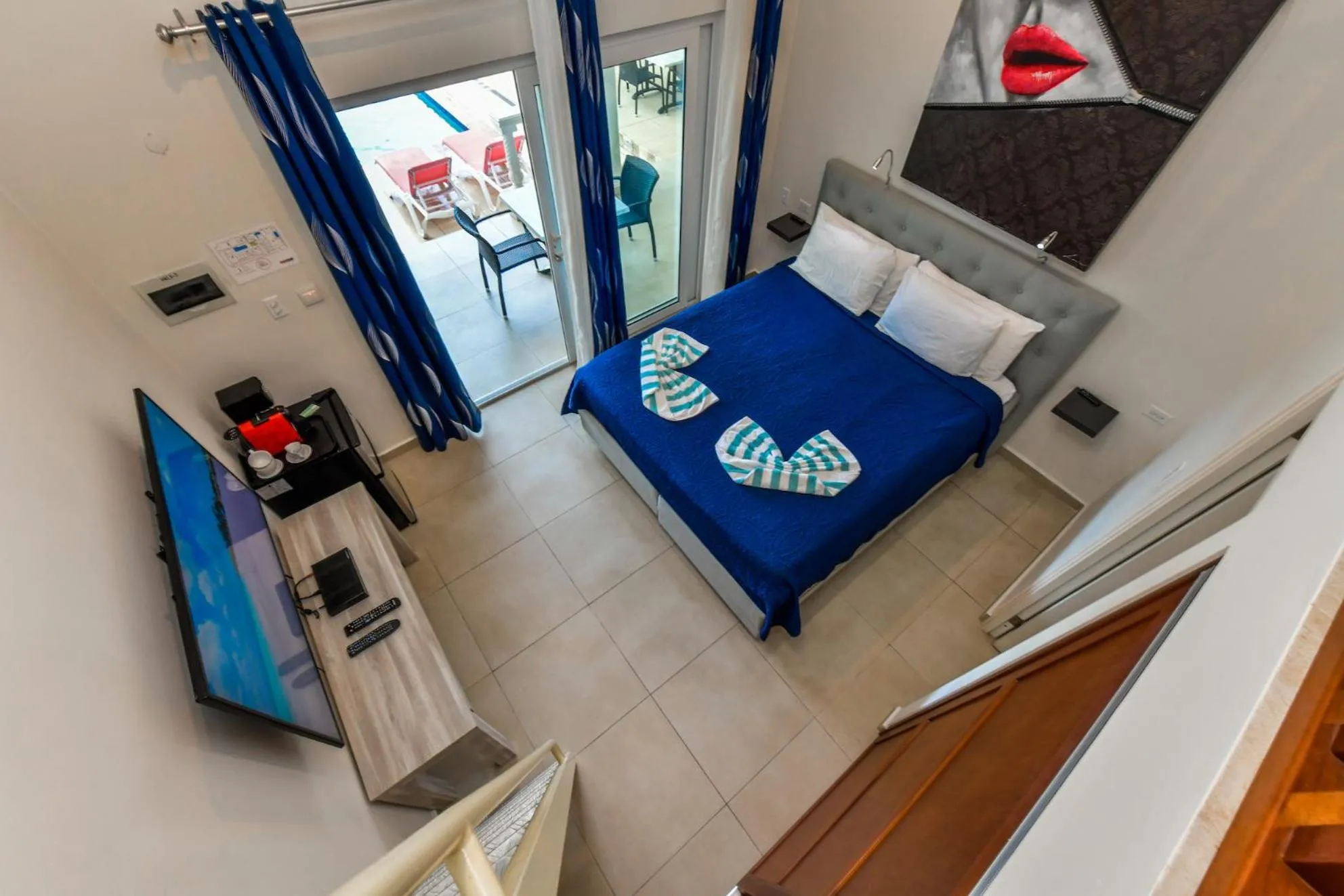 Bed in Boutique Hotel Swiss Paradise Aruba Villas and Suites