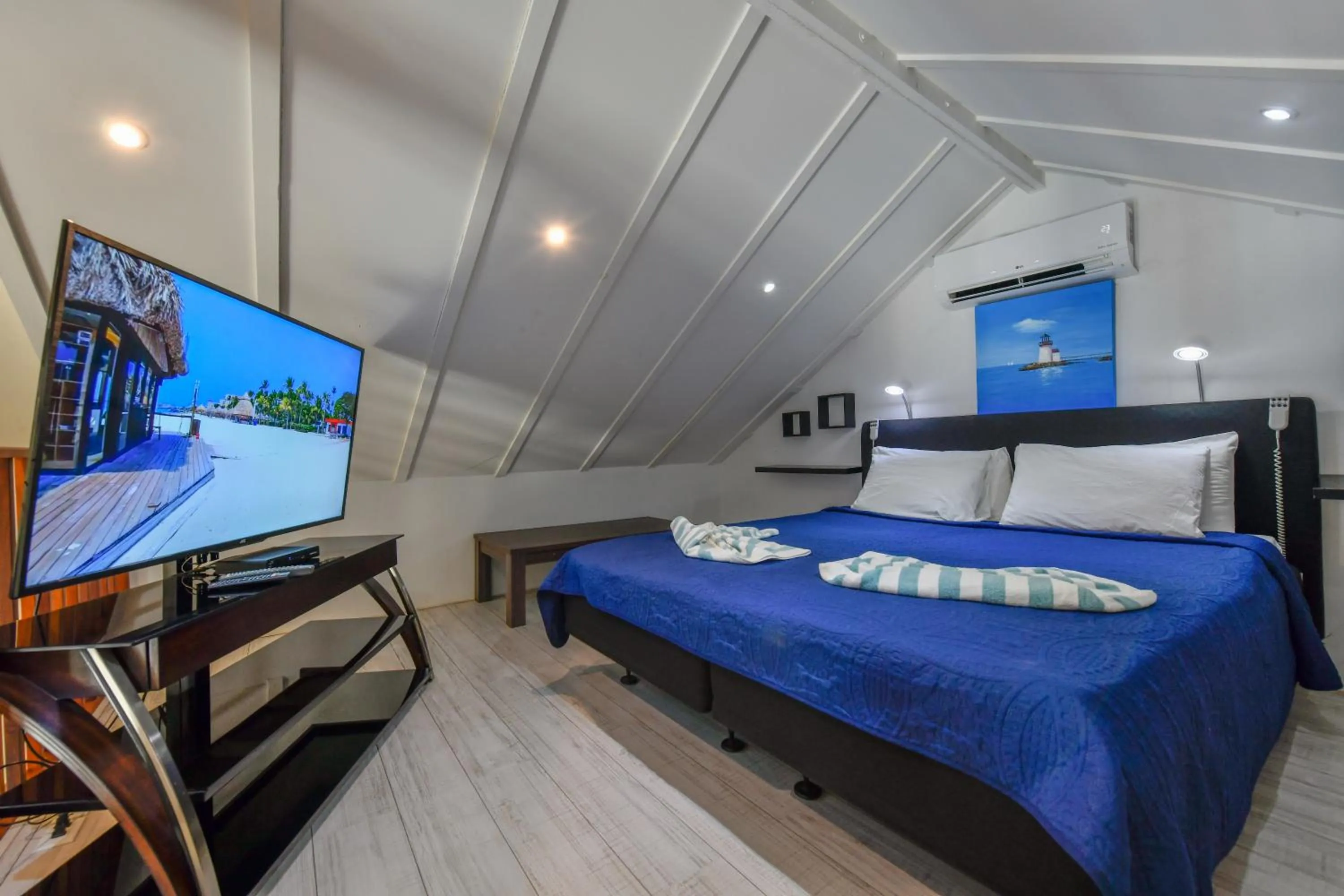 Bed in Boutique Hotel Swiss Paradise Aruba Villas and Suites