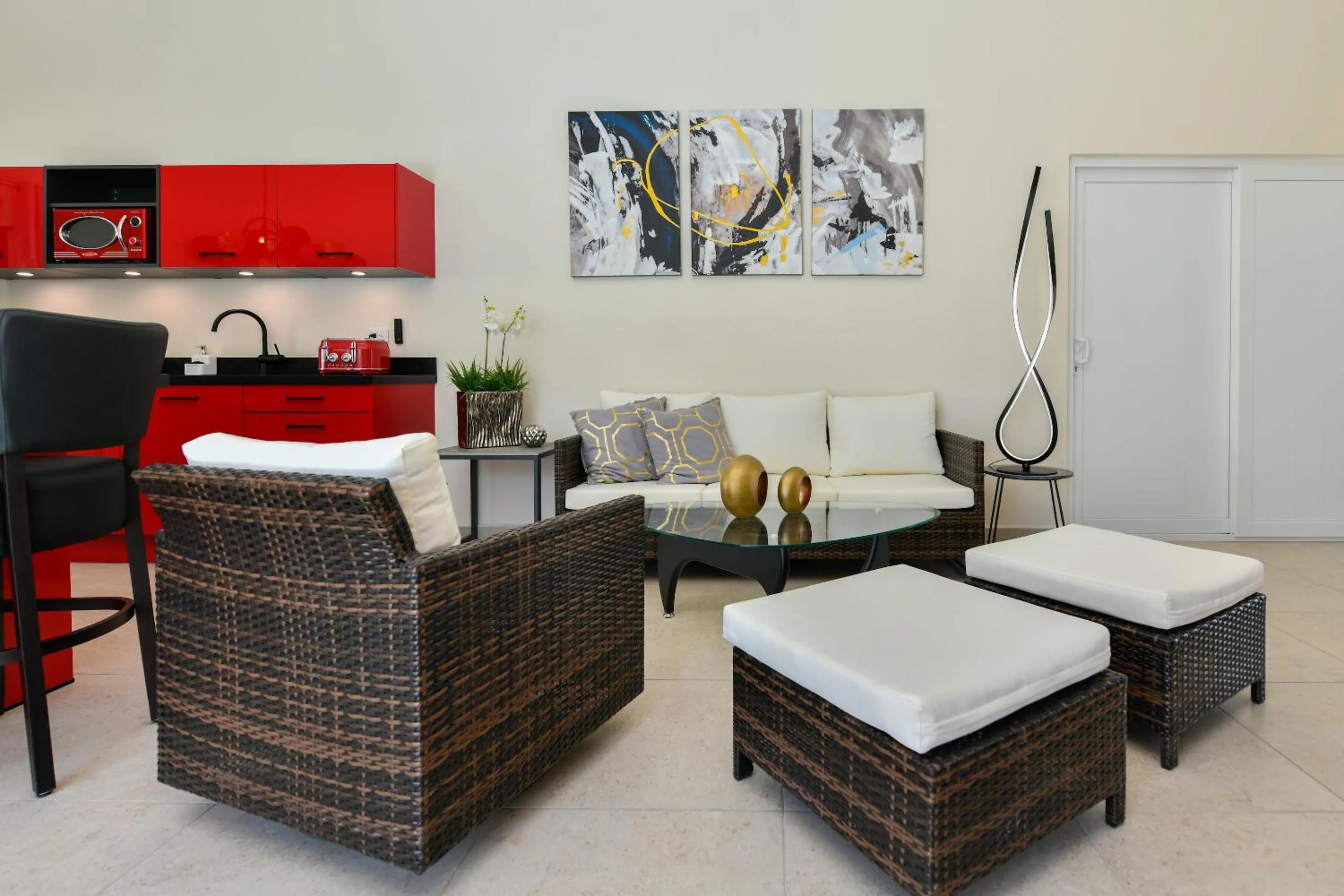 Living room, Bed in Boutique Hotel Swiss Paradise Aruba Villas and Suites