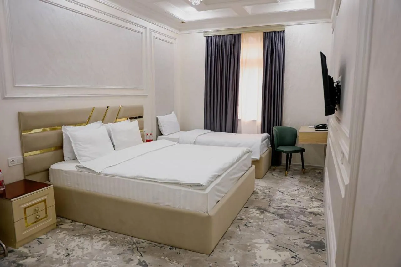 Bed in Ko'k Saroy Plaza Hotel