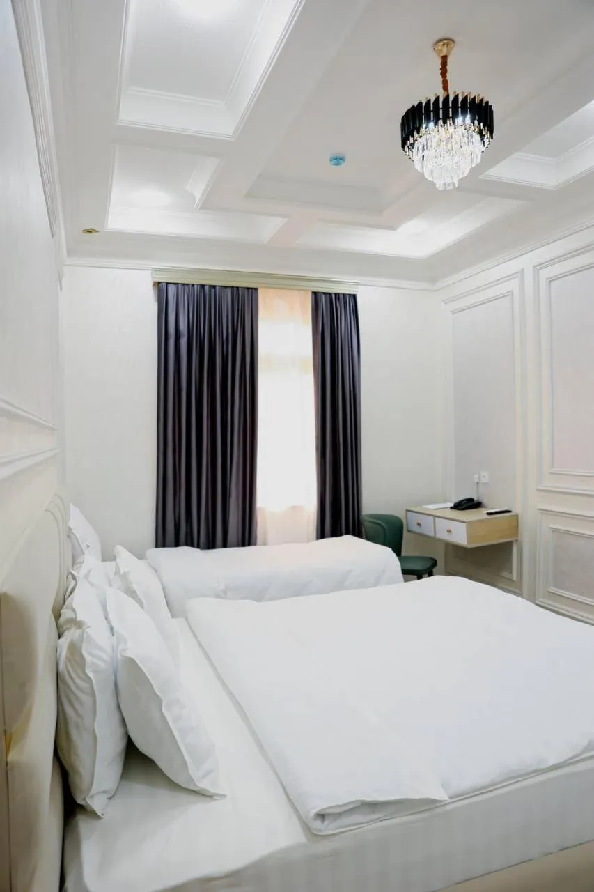 Bed in Ko'k Saroy Plaza Hotel