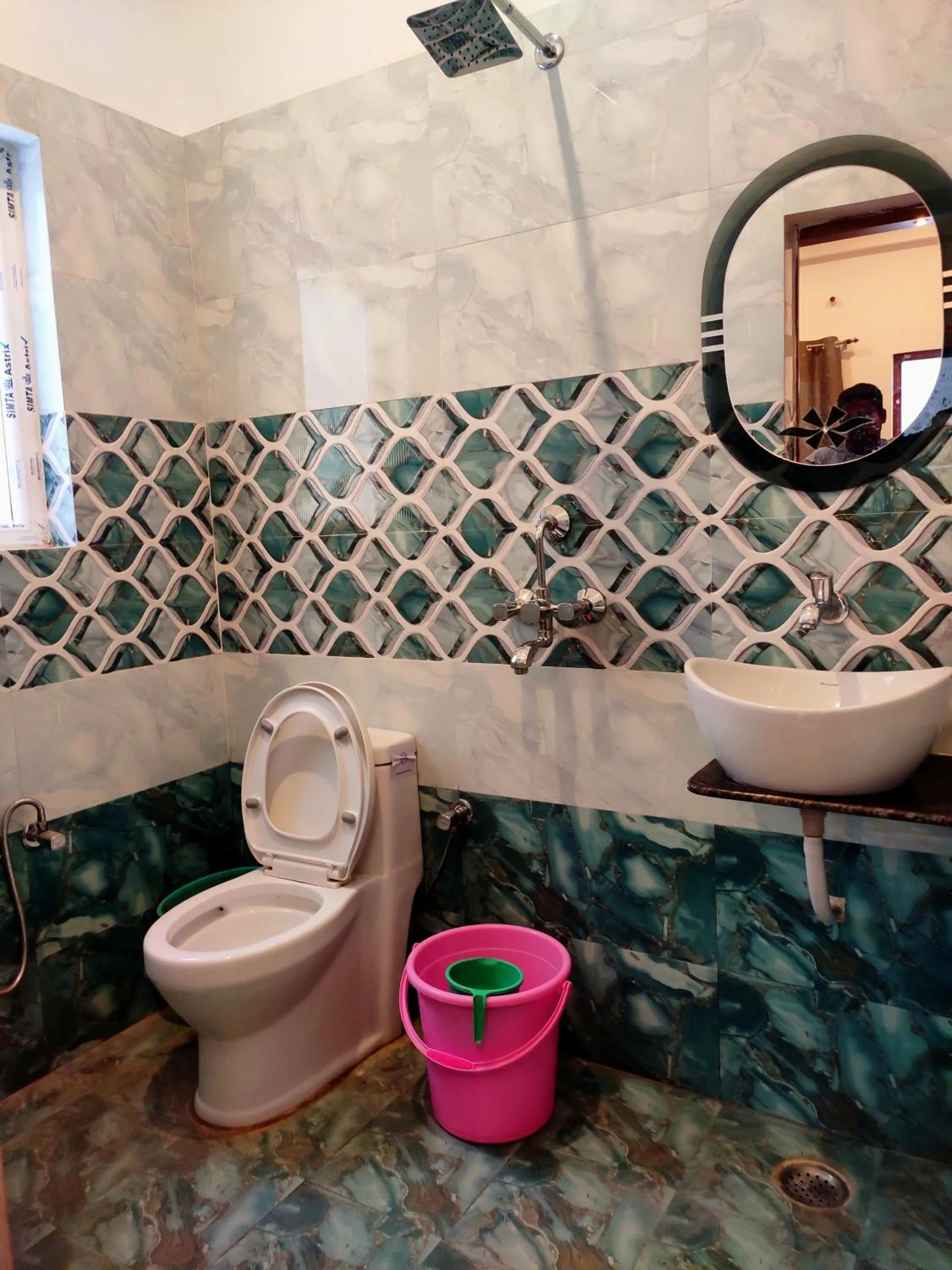 Bathroom in Khushi Paying Guest House