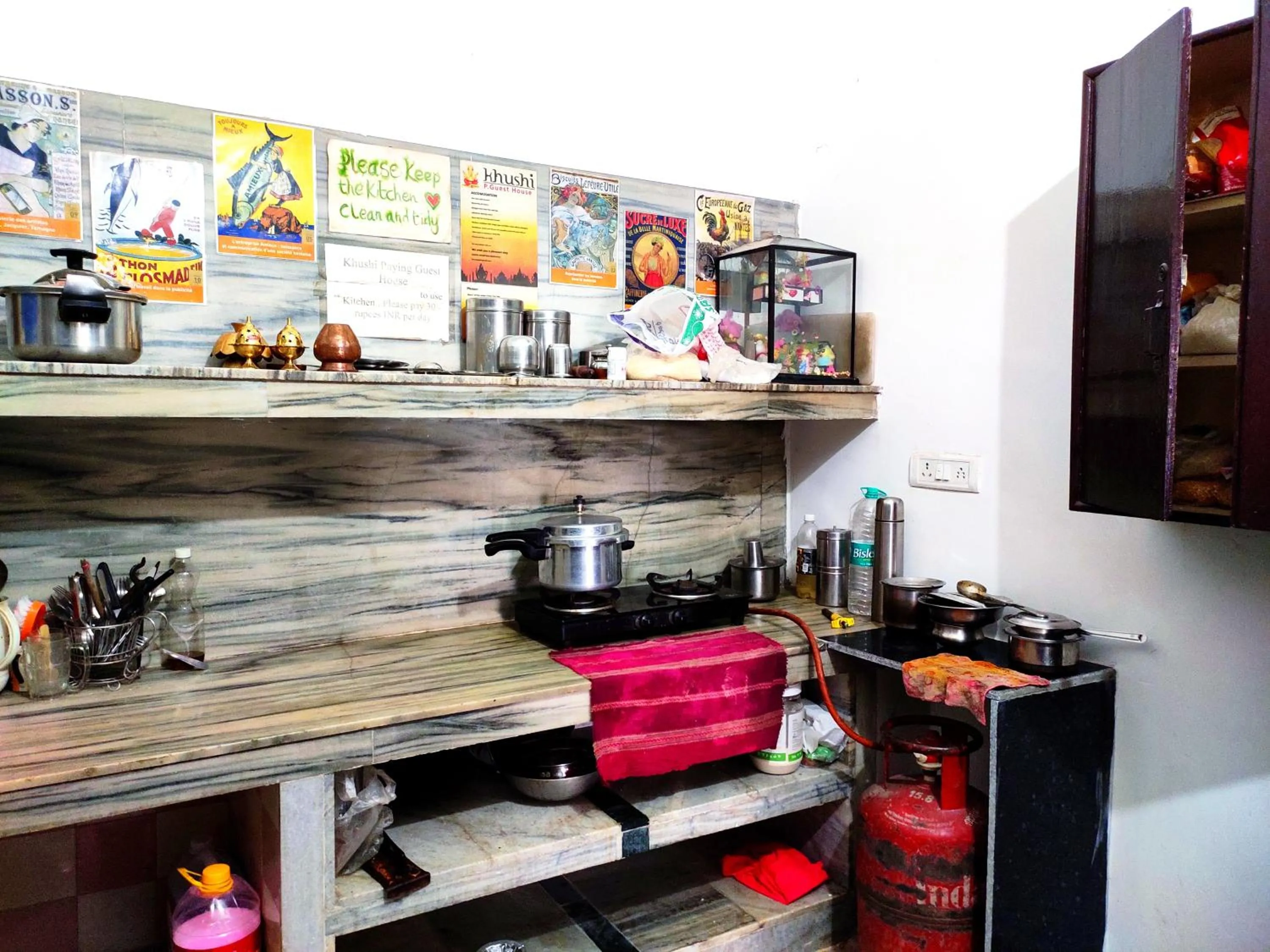 kitchen in Khushi Paying Guest House