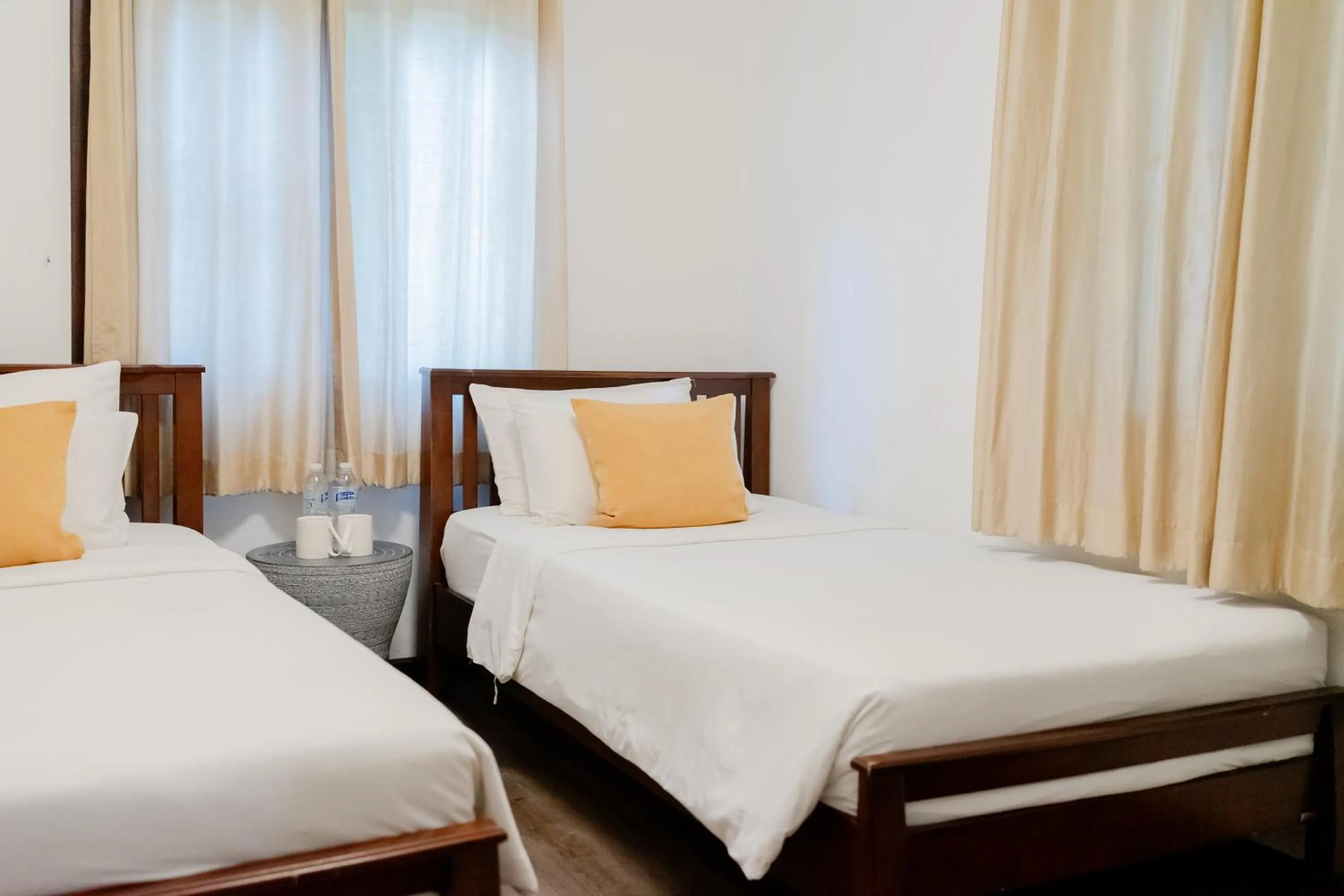 Bed in Tolani Southgate Villa Chiang Mai