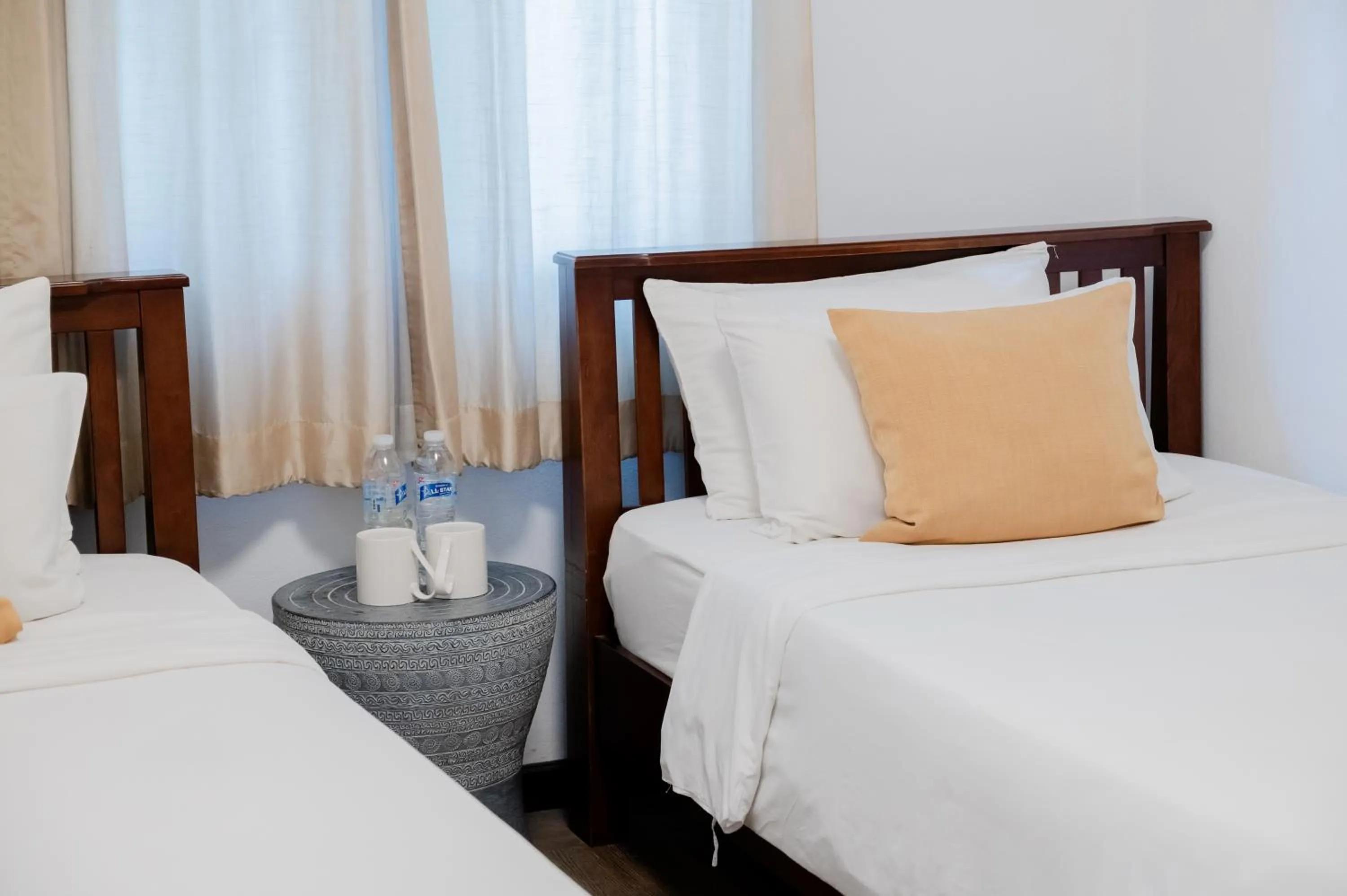 Bed in Tolani Southgate Villa Chiang Mai